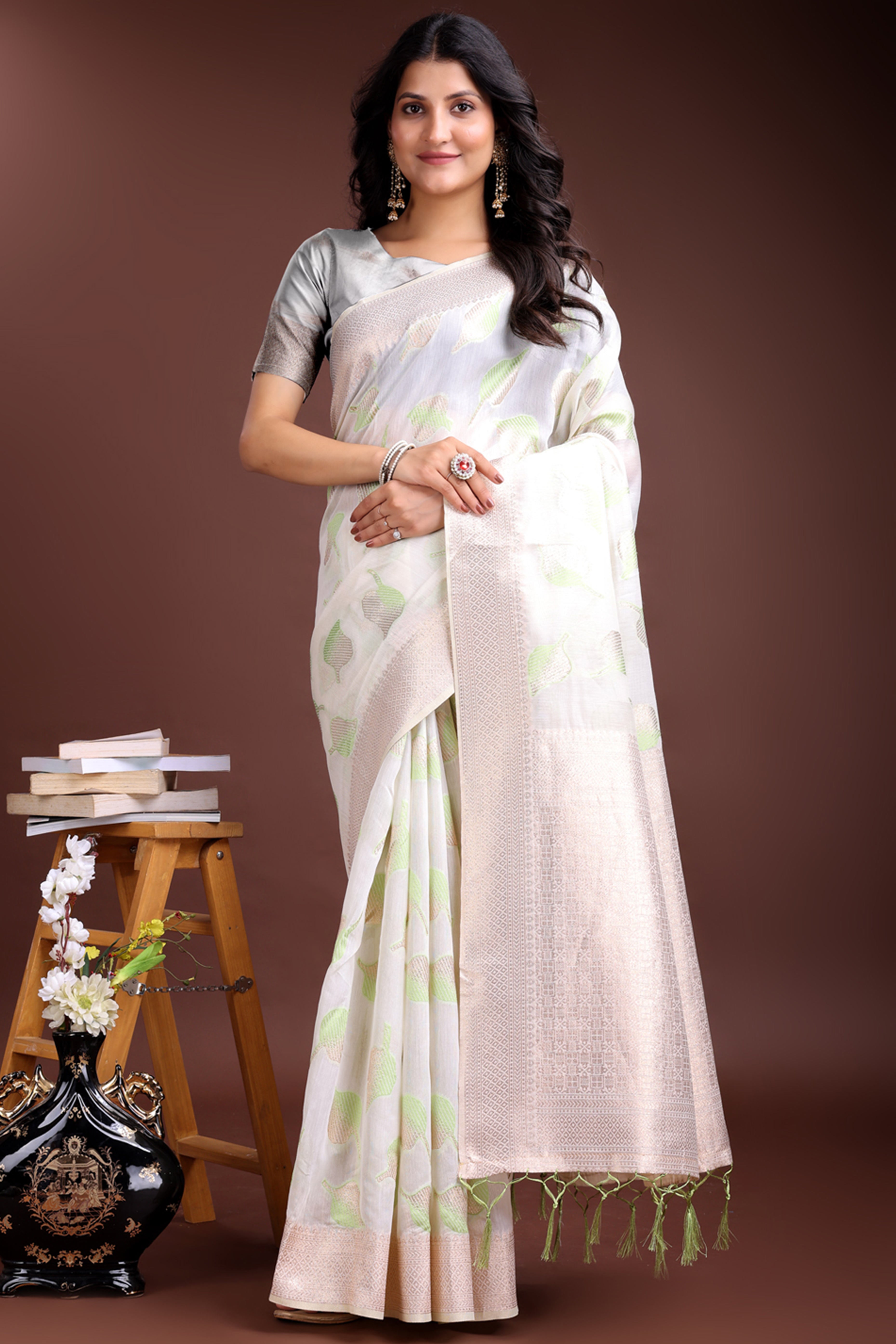 White and Light Green Cotton Silk Saree with Leaf Motifs and Zari Border Tassels