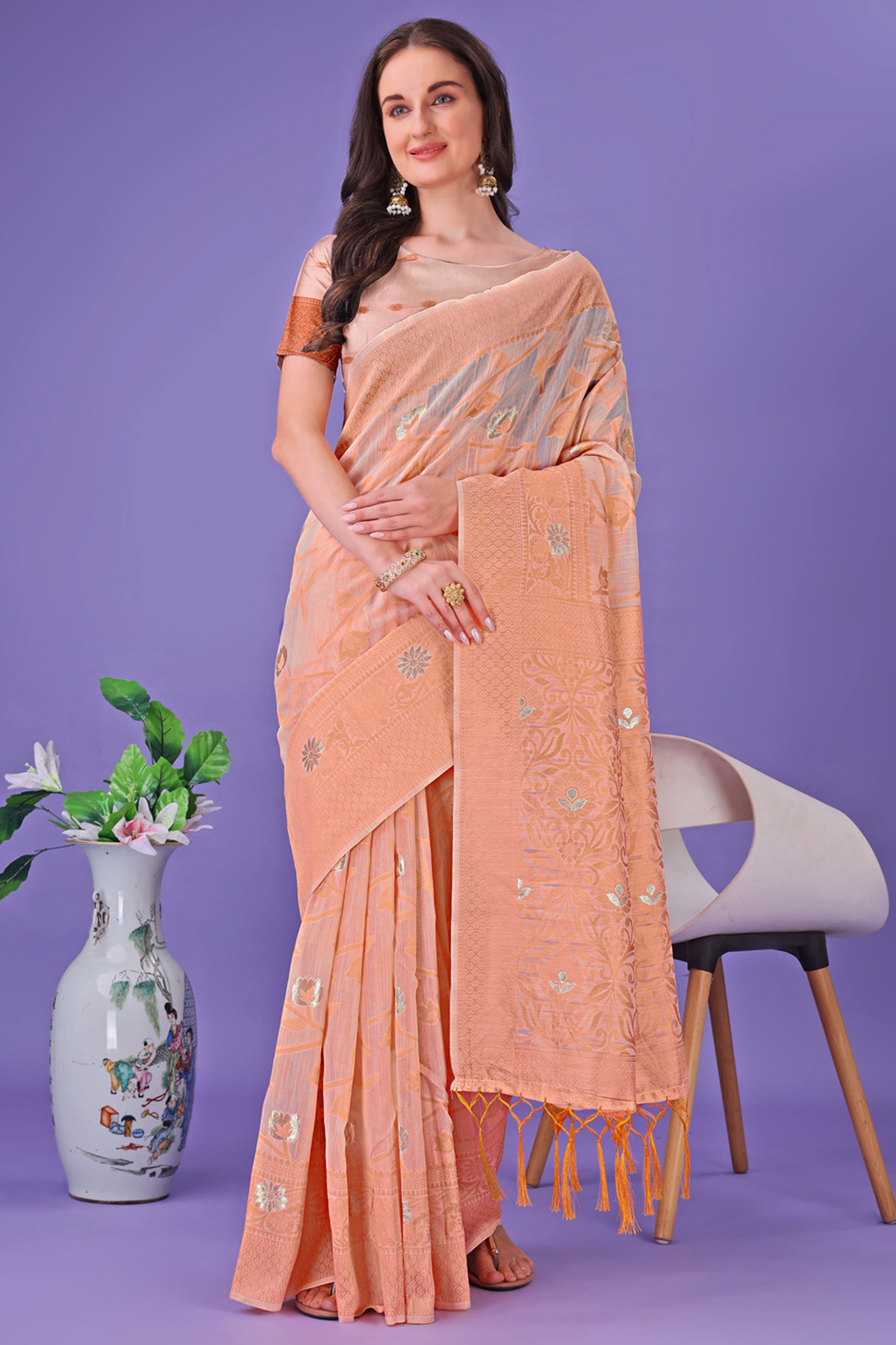 Peach Floral Pattern Woven Saree in a Soft Cotton Blend with Tasseled Edges