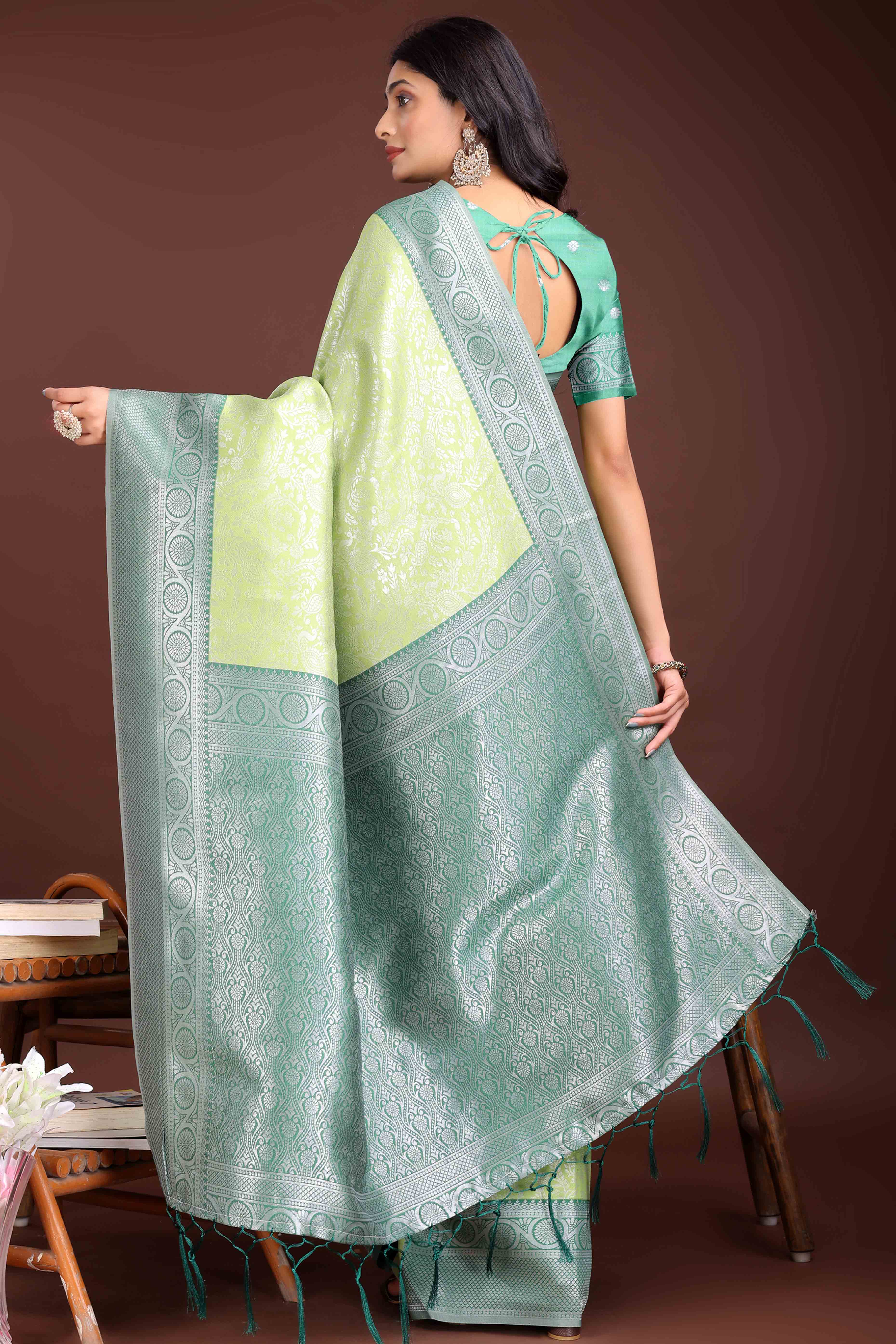 Light Green Floral Zari Weaving Lichi Cotton Silk Saree With Tassel Border