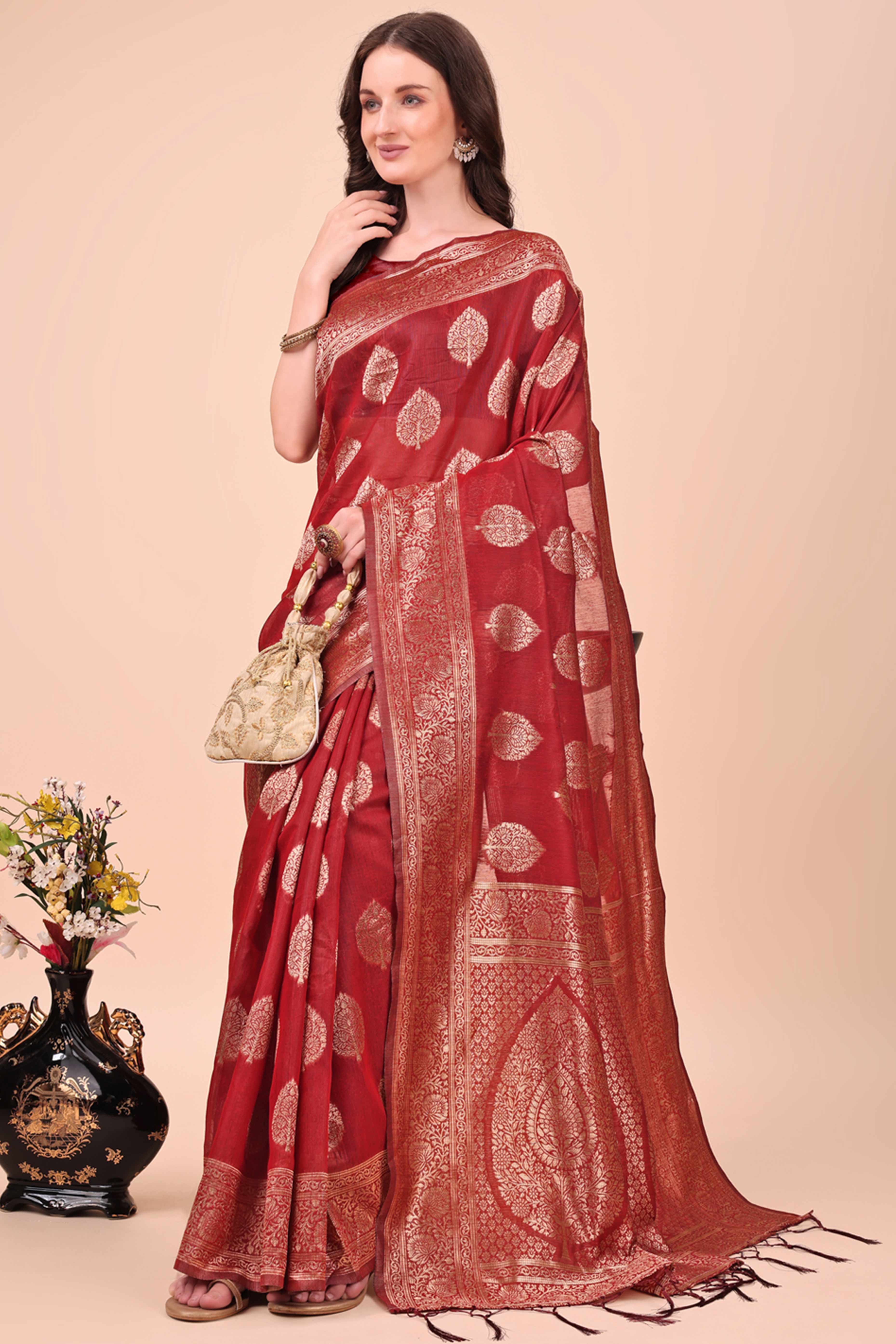Maroon Cotton Blend Saree With Intricate Floral Zari Weaving & Elegant Tassel Accents