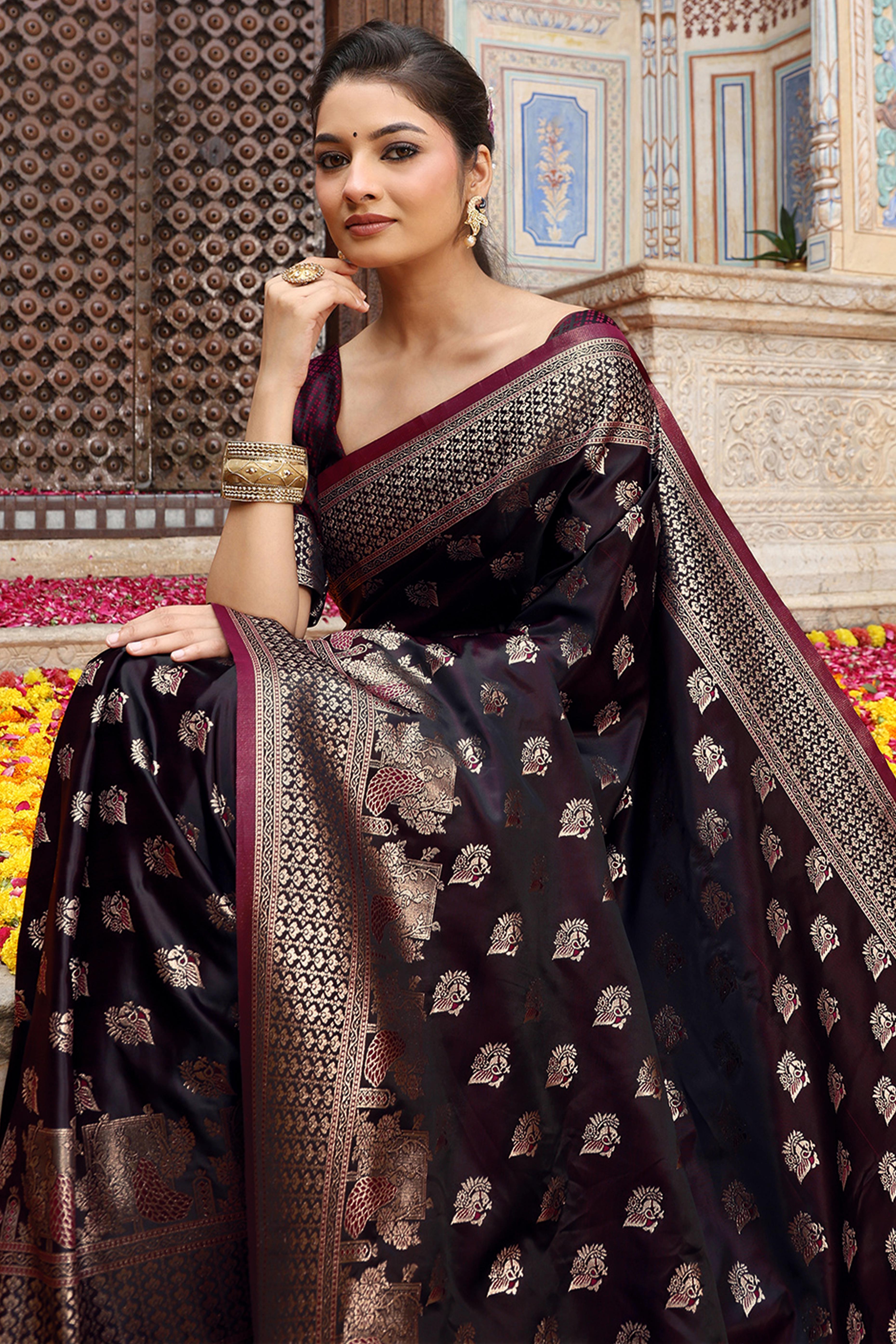 Designer Wine Saree Showcasing Peacock & Floral Zari Weaving With Handmade Tassel Pallu