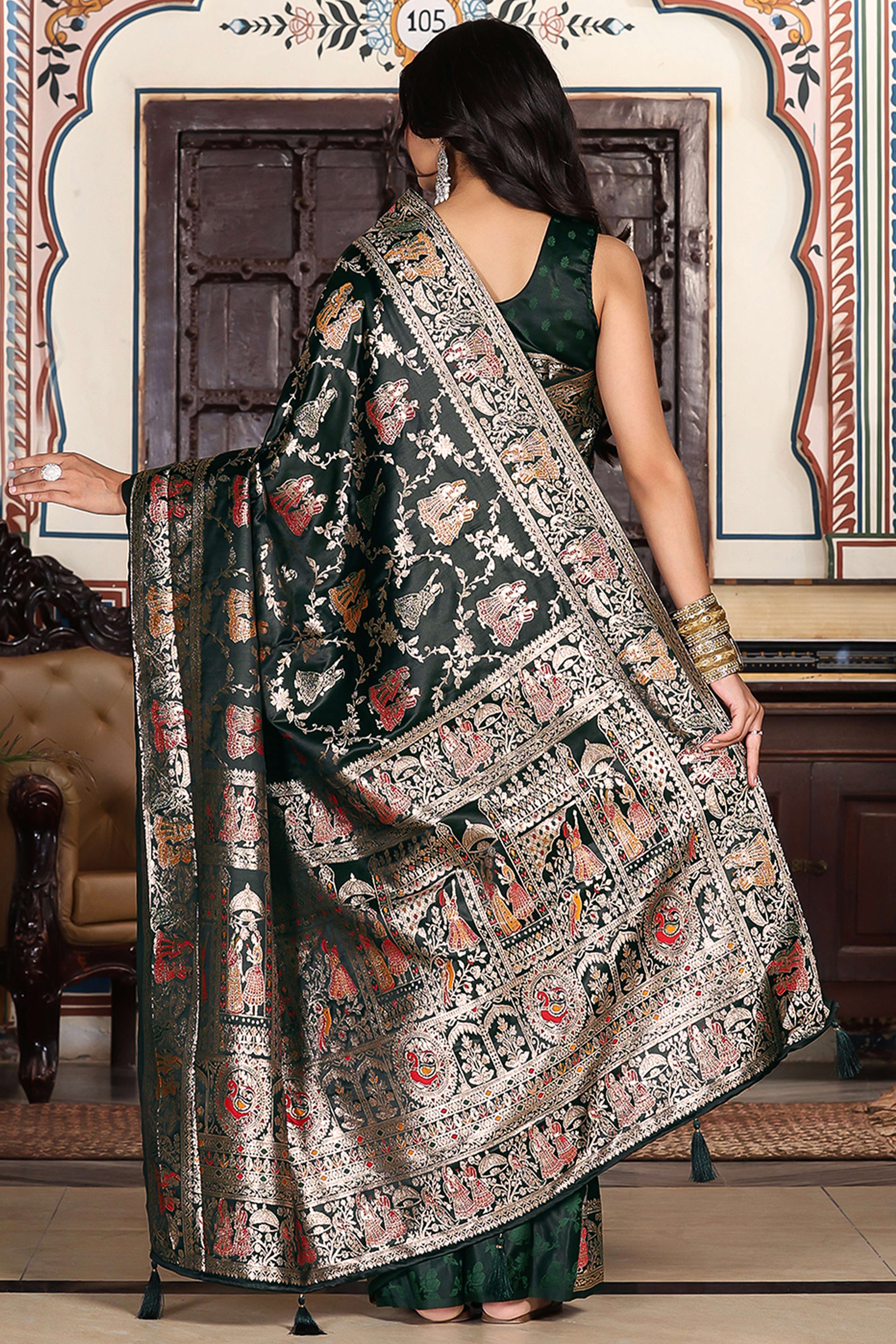 Luxurious Dark Green Silk Blend Saree With Intricate Floral Zari Weaving & Tassel Pallu