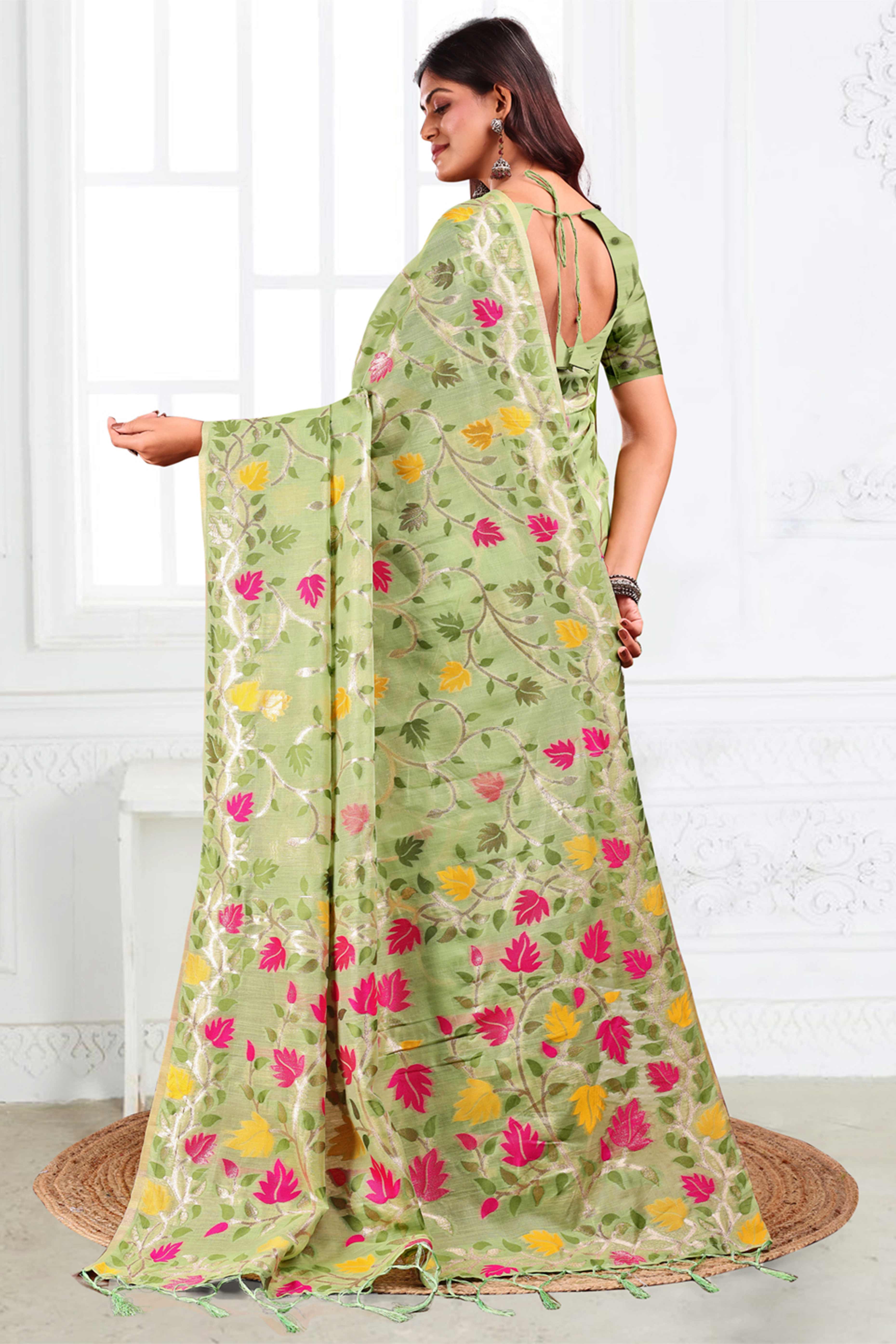 Light Green Linen Cotton Silk  Saree Enhanced With Floral Zari Weaving & Tasselled Pallu Finish
