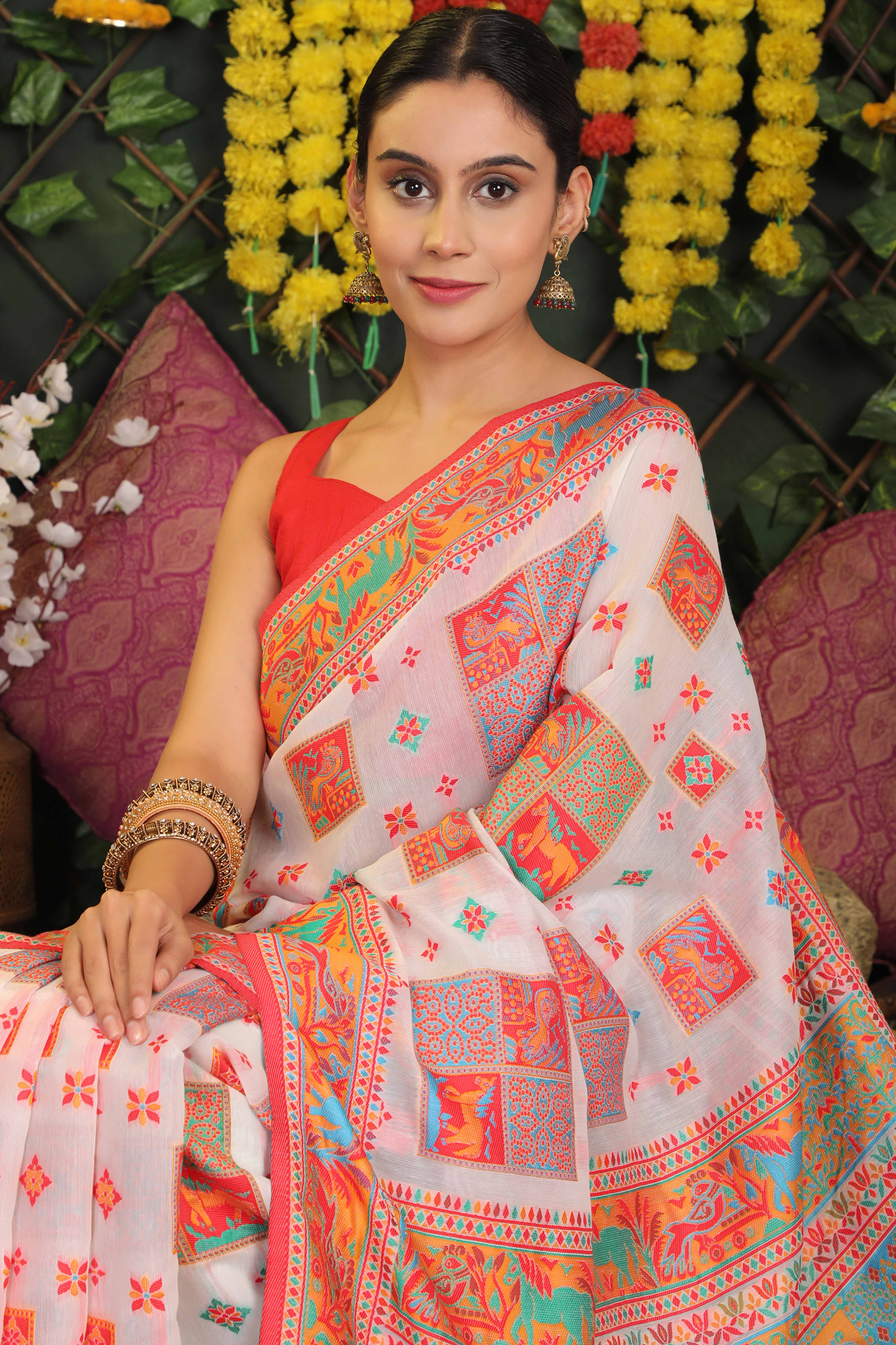 White Linen Cotton Saree Adorned With Floral Zari Weaving & Tassel Pallu