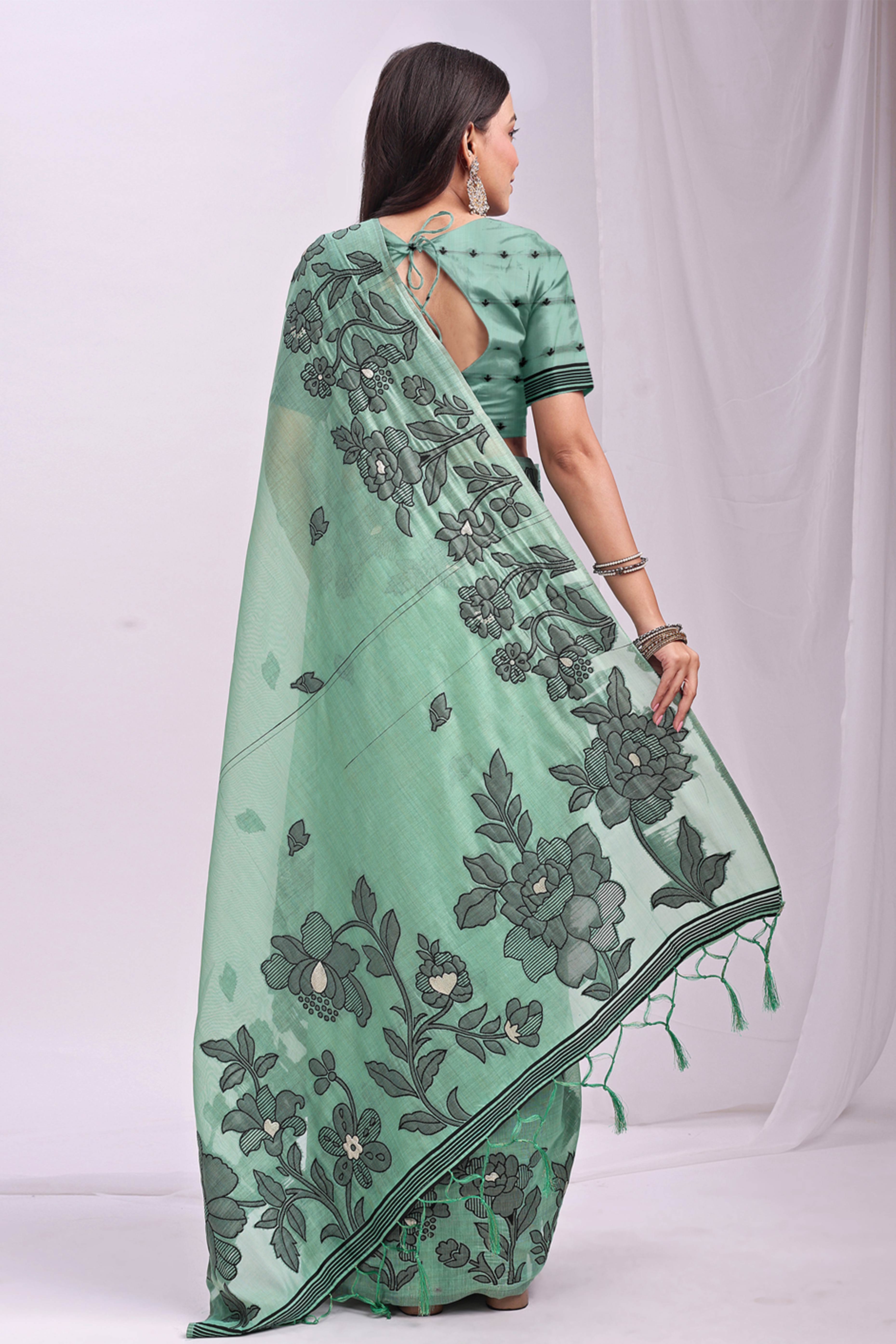Rama Green Ethnic Saree in a Linen Cotton Blend Adorned with Floral Weave Designs