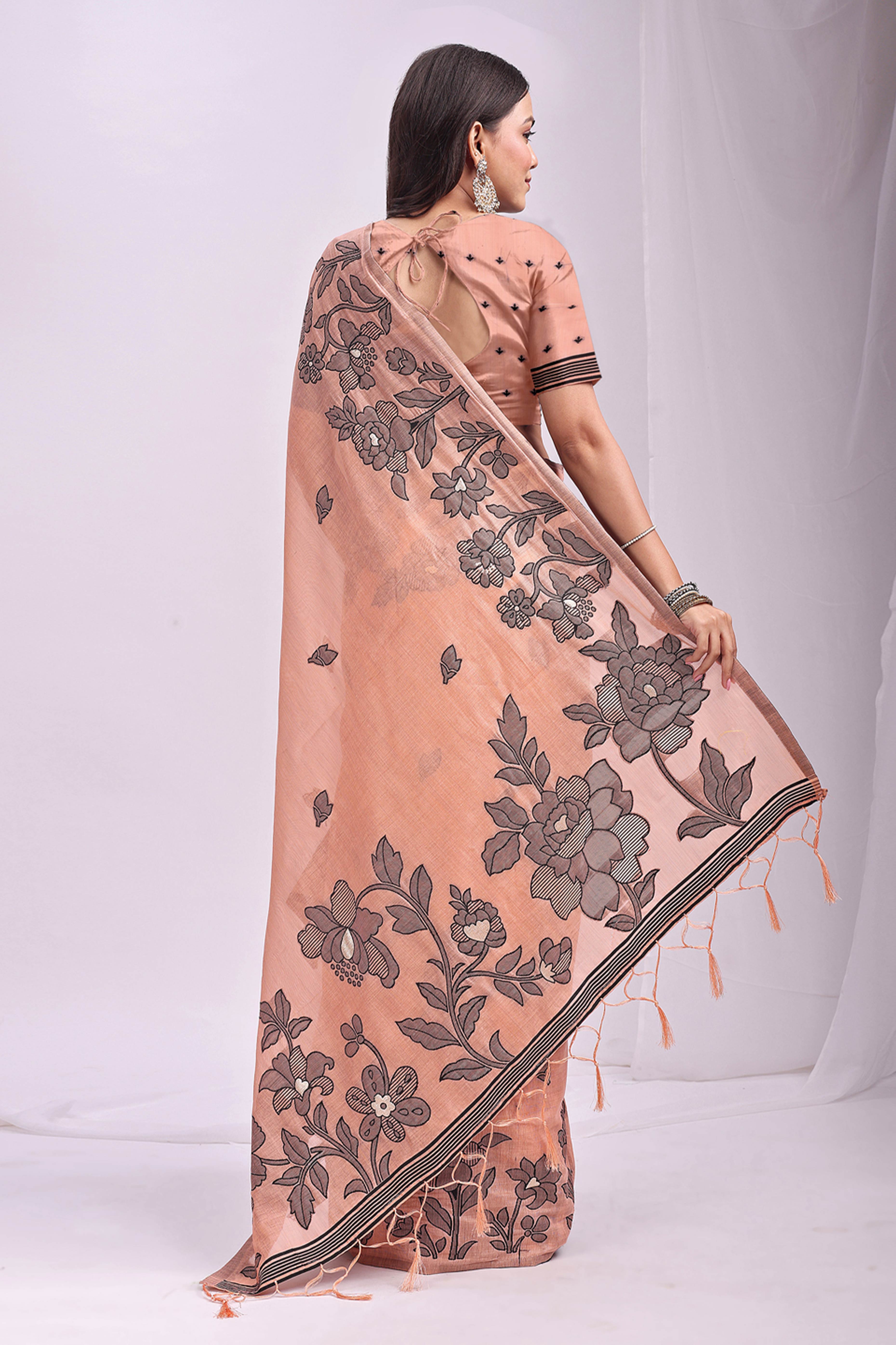 Orange Ethnic Saree in a Linen Cotton Blend Adorned with Floral Weave Designs