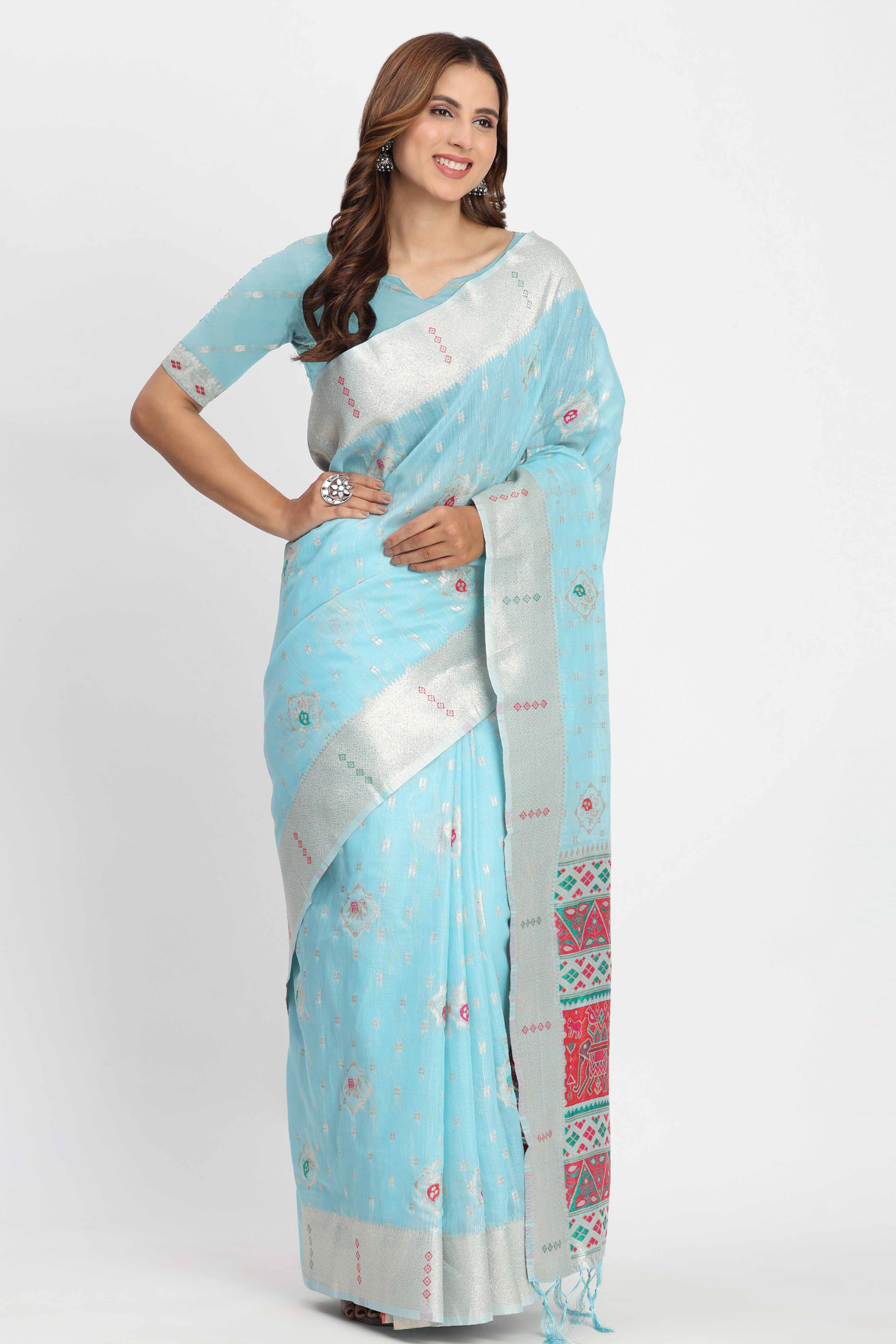 Shimmering Sky Blue linen Cotton Saree Embellished With Rich Zari Weaving And Tassels Pallu