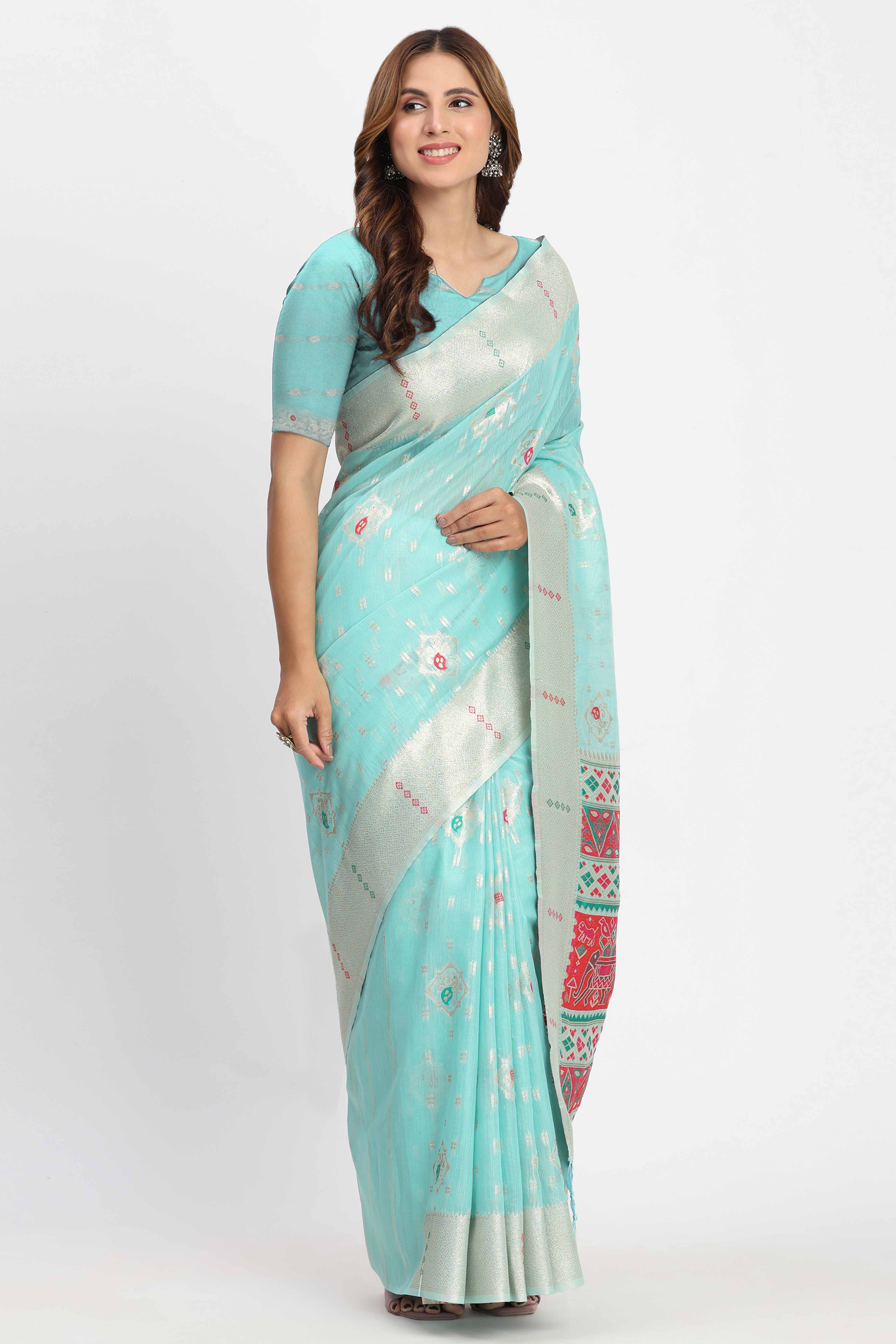 Shimmering Turquoise linen Cotton Saree Embellished With Rich Zari Weaving And Tassels Pallu