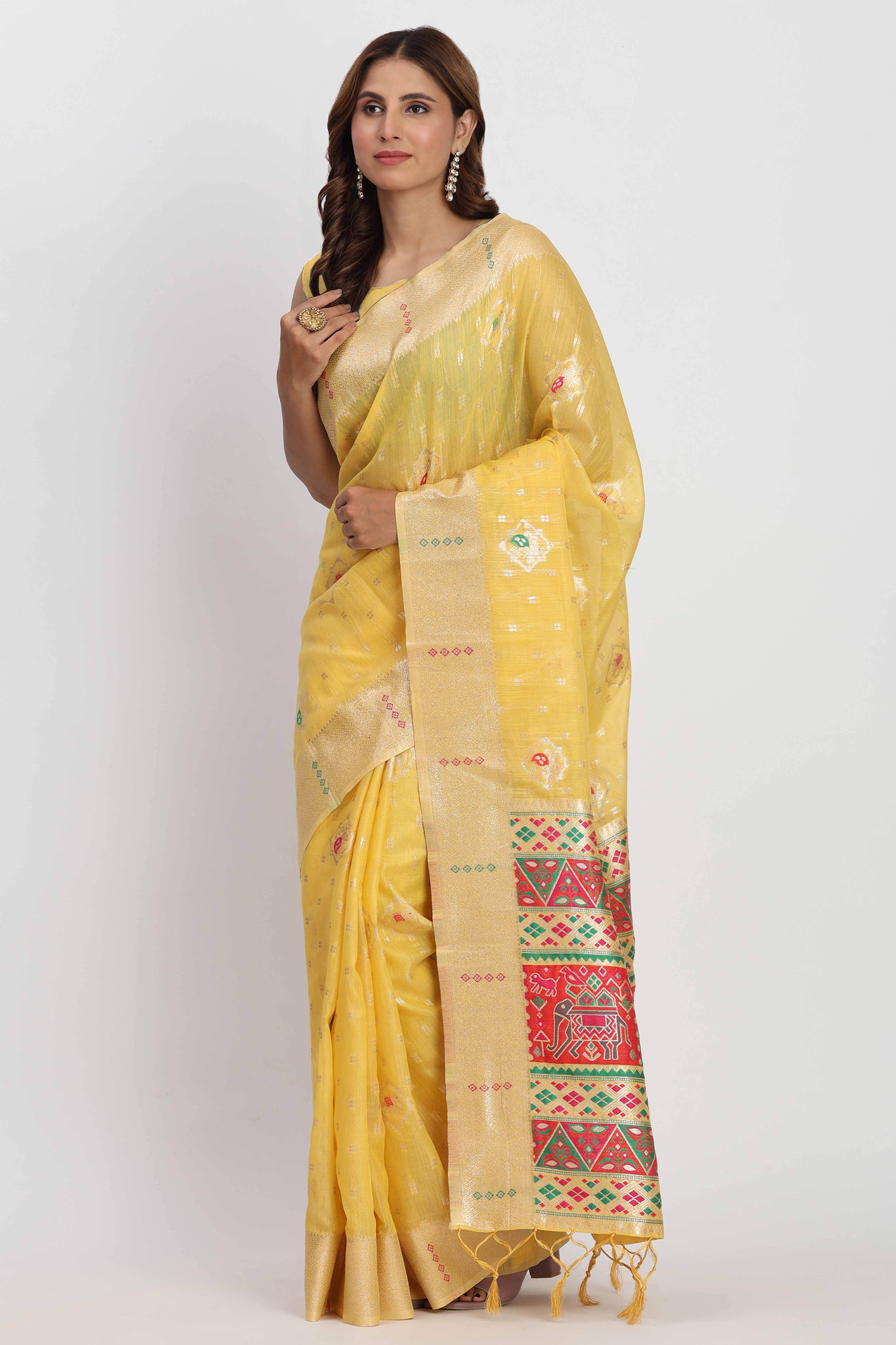 Shimmering Yellow linen Cotton Saree Embellished With Rich Zari Weaving And Tassels Pallu