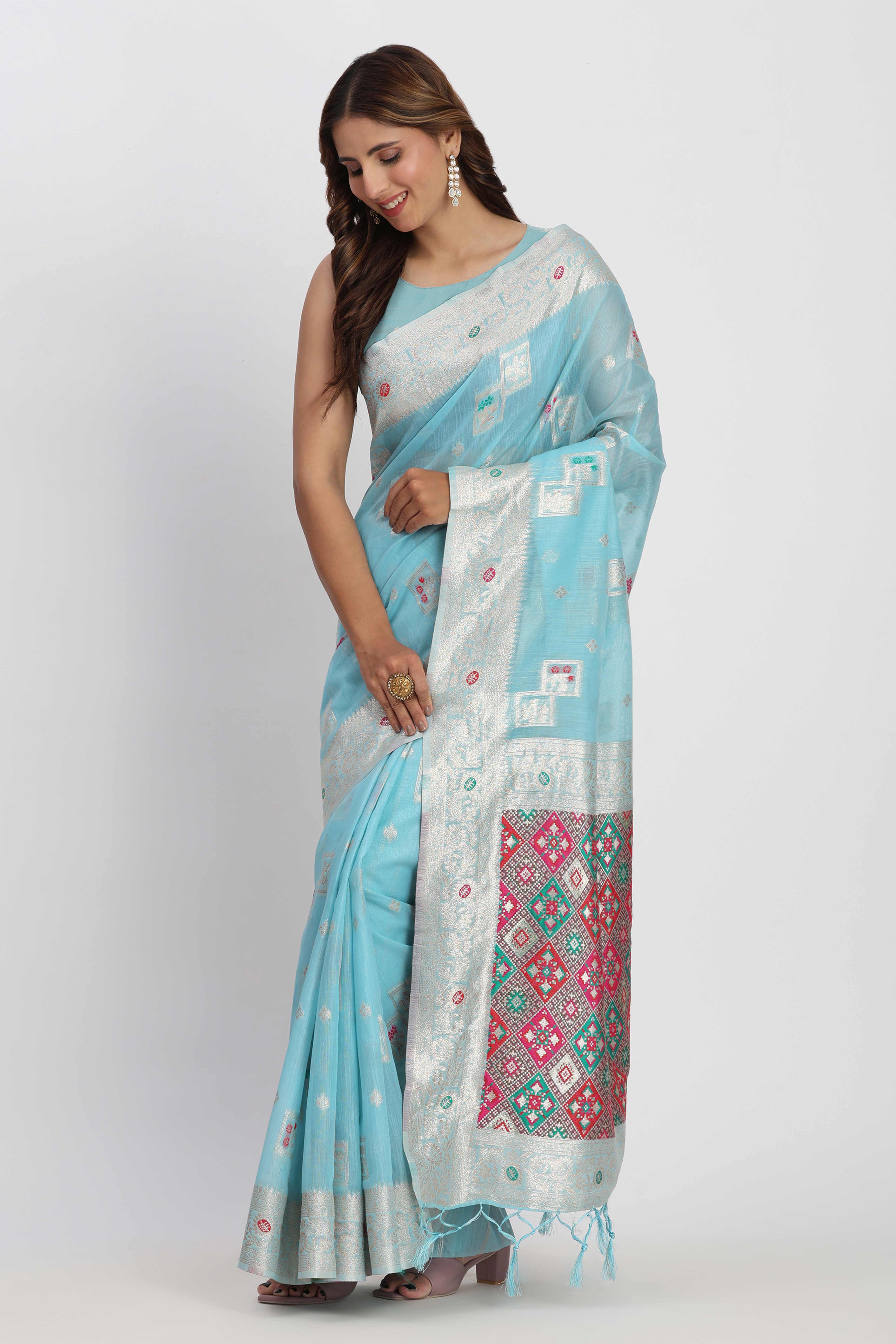 Floral Zari Weaving Brings Regal Beauty To This Sky Blue Linen Cotton Saree With Tassel Accents