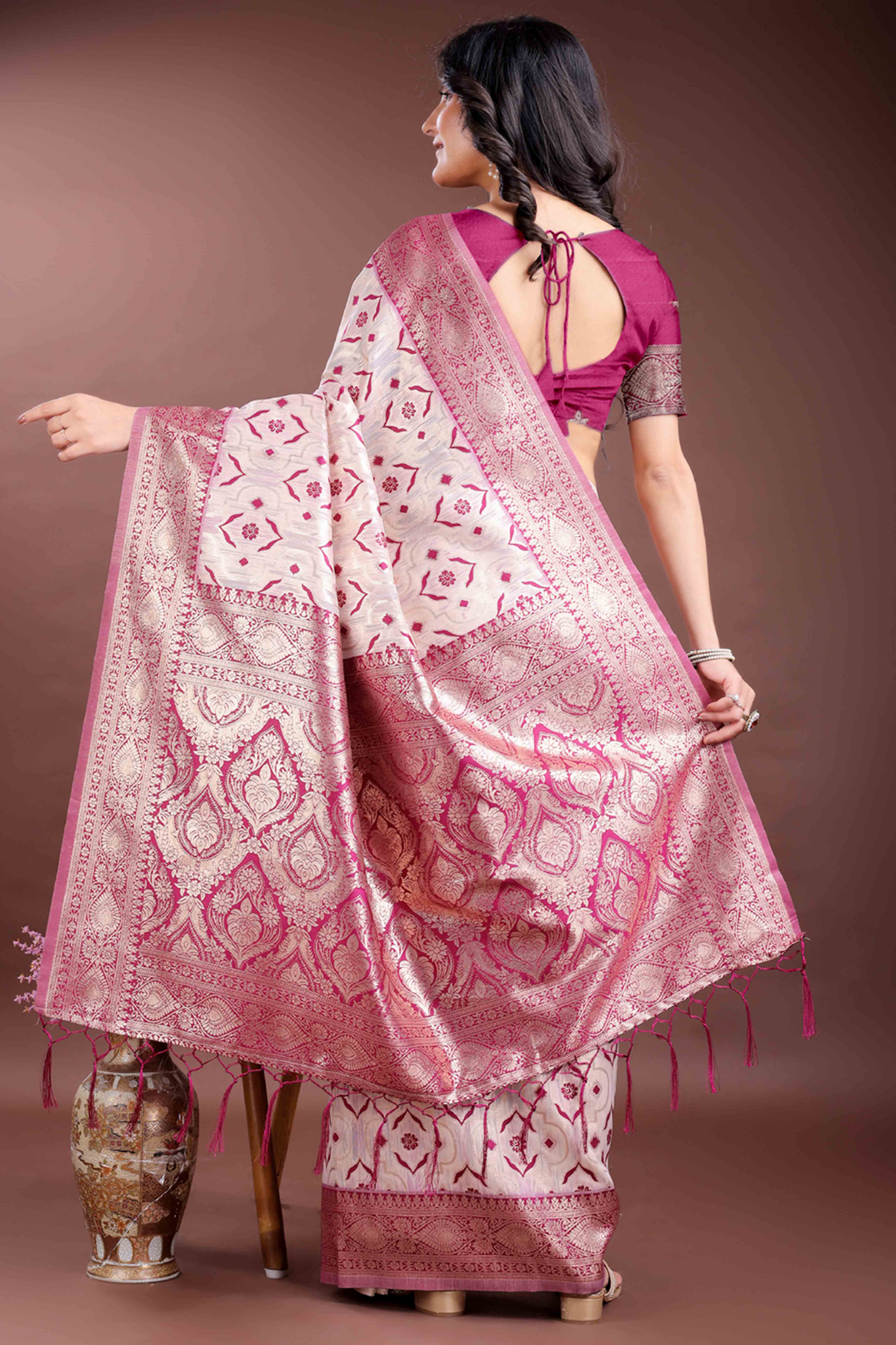 Vibrant Magenta Traditional Ikkat Style Zari Weaving Cotton Blend Saree with Bold Tassel Accents