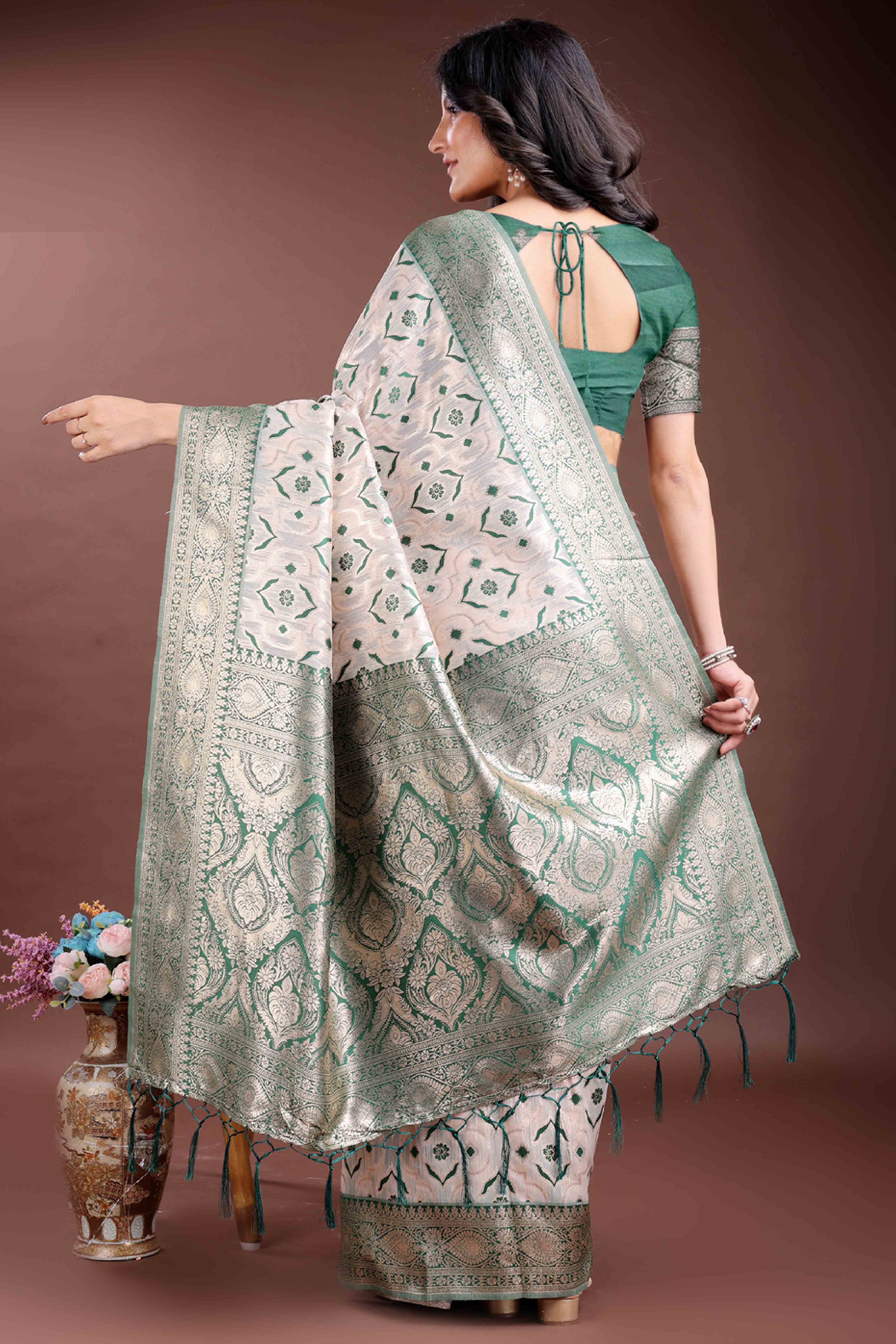 Refreshing Green Traditional Ikkat Style Zari Weaving Cotton Blend Saree with Harmonious Tassels