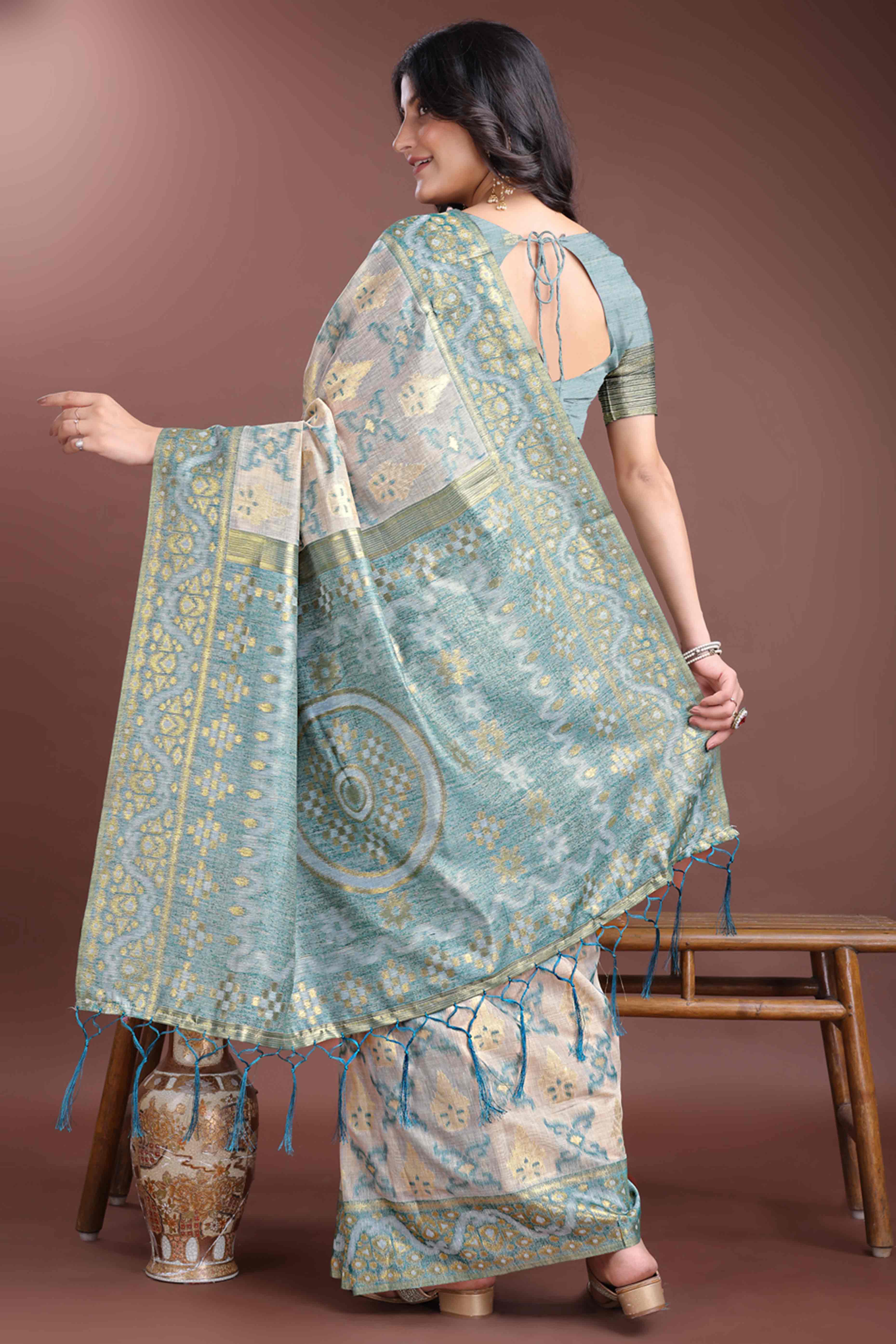 Serene Sea Green Traditional Ikkat Style Zari Weaving Cotton Blend Saree with Artistic Tassel Details