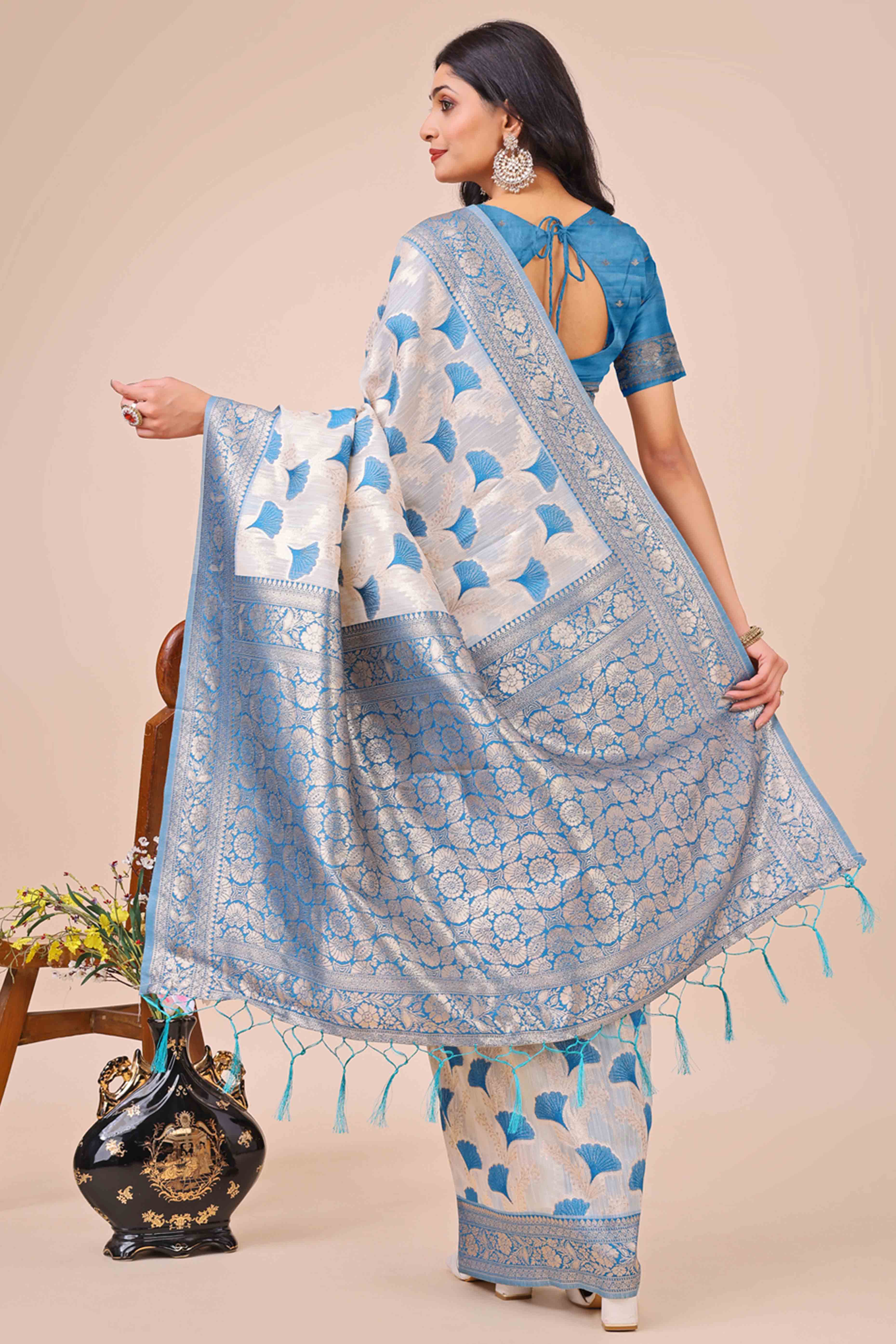 Blue Saree In Linen Cotton With Beautiful Floral Woven Patterns & a Tassel