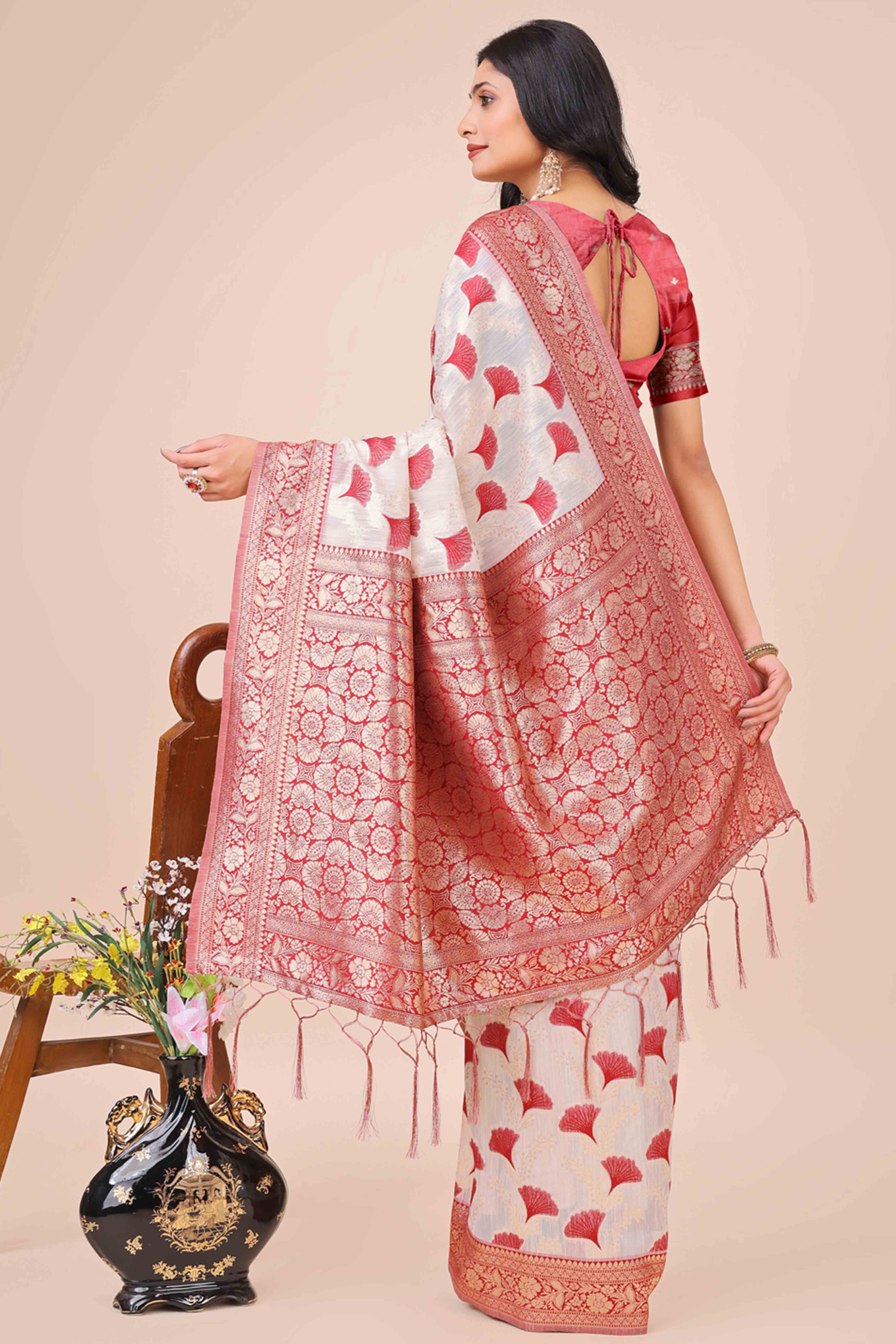 Maroon Saree In Linen Cotton With Beautiful Floral Woven Patterns & a Tassel