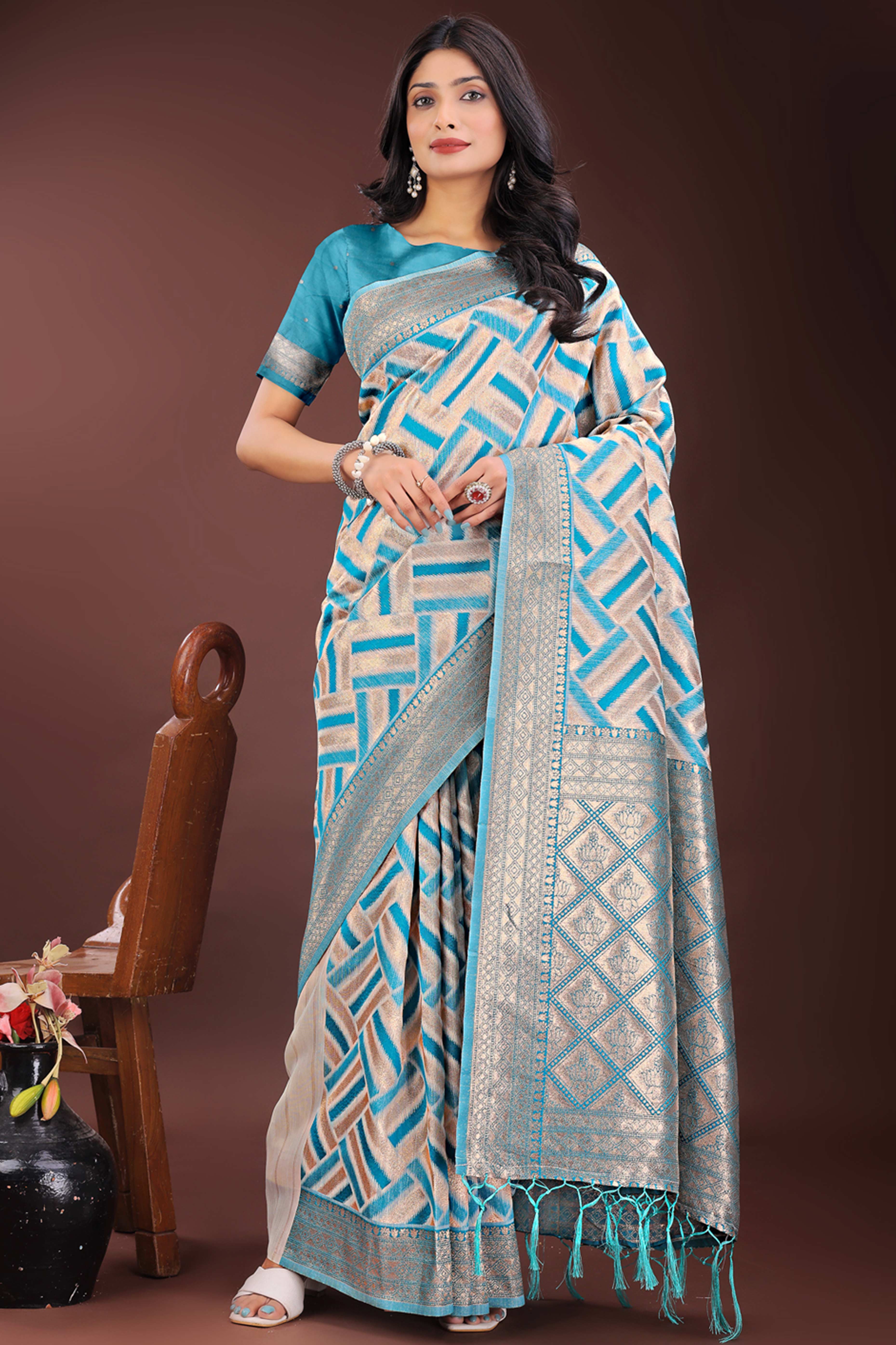 Teal Saree with Zari Woven Geometric Motifs and Graceful Tassel Accents