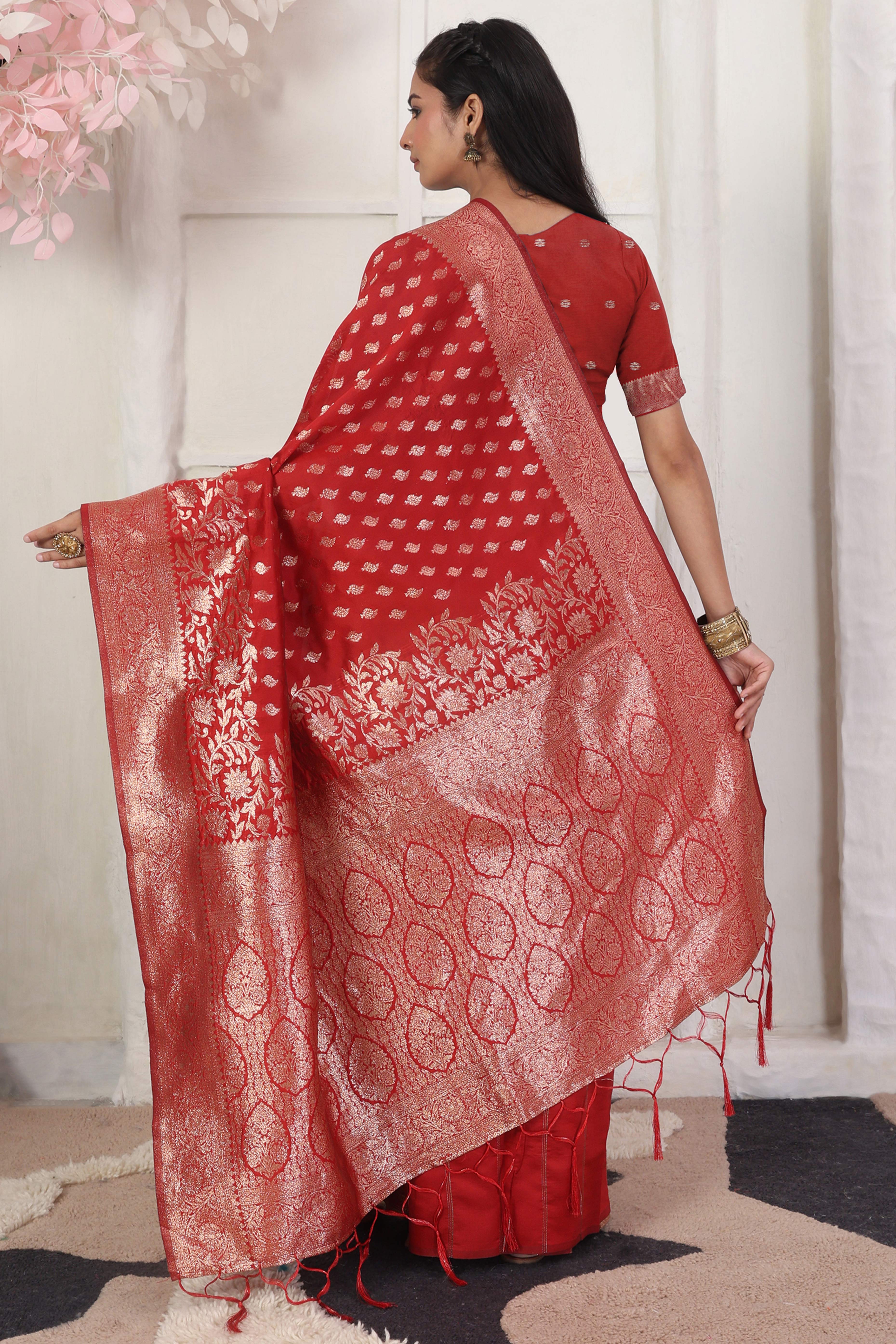 Red Traditional Lichi Silk Blend Saree Enhanced With Floral Zari Weaving & Tassel Pallu