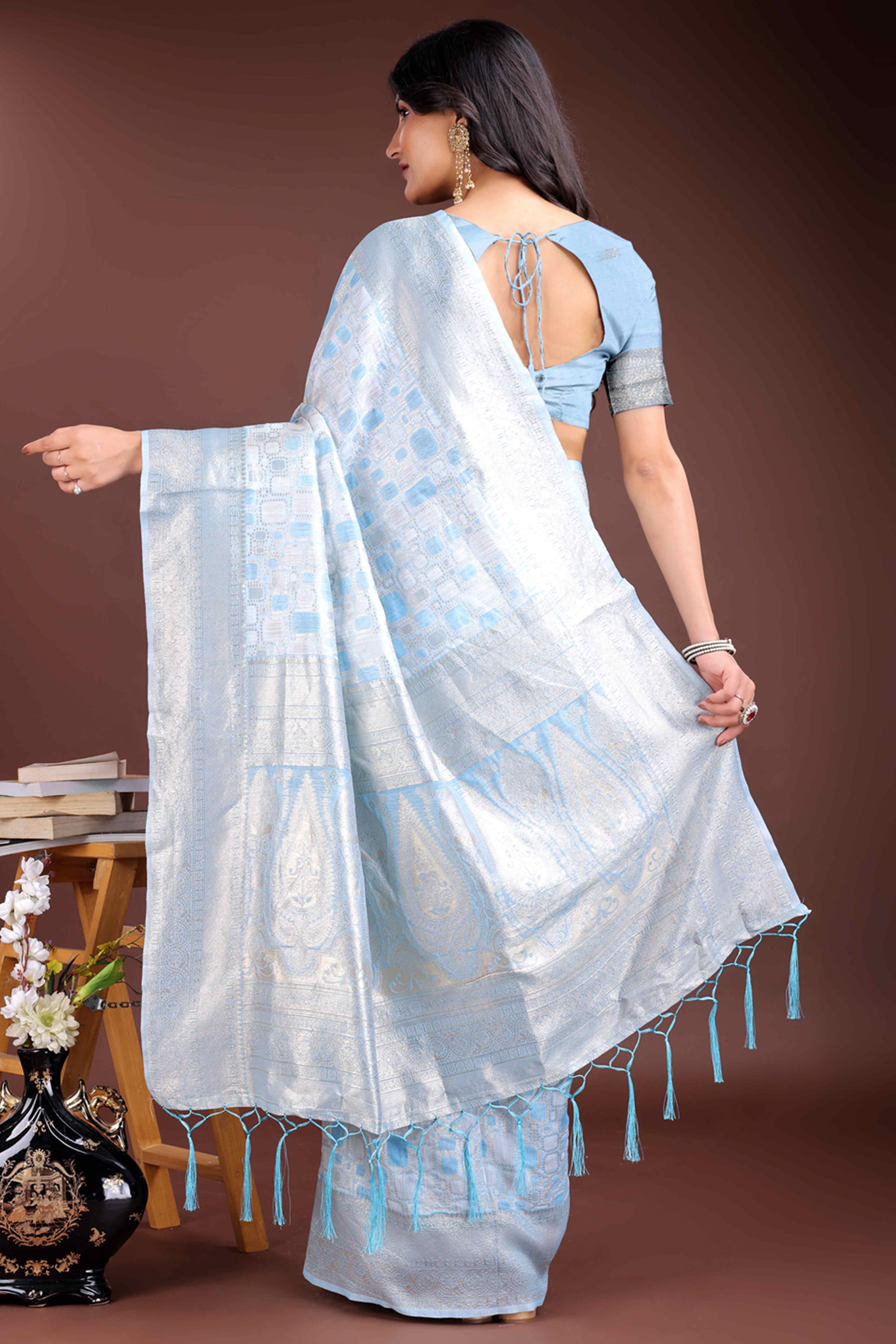 Breathtaking Sky Blue Geometric Style Zari Weaving Cotton Blend Saree Enhanced with Elegant Tassels