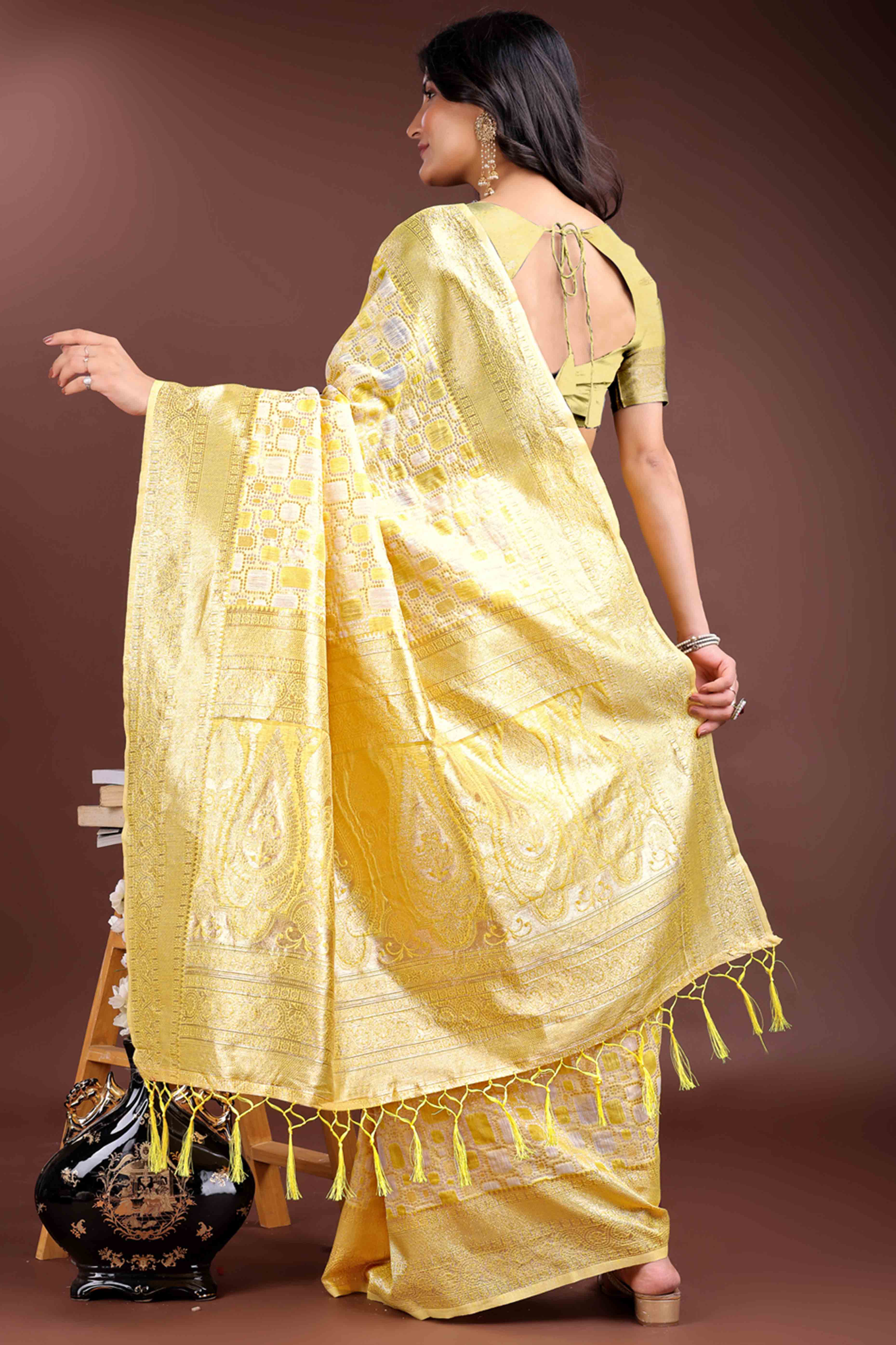 Radiant Yellow Geometric Style Zari Weaving Cotton Blend Saree Accented with Vibrant Tassels