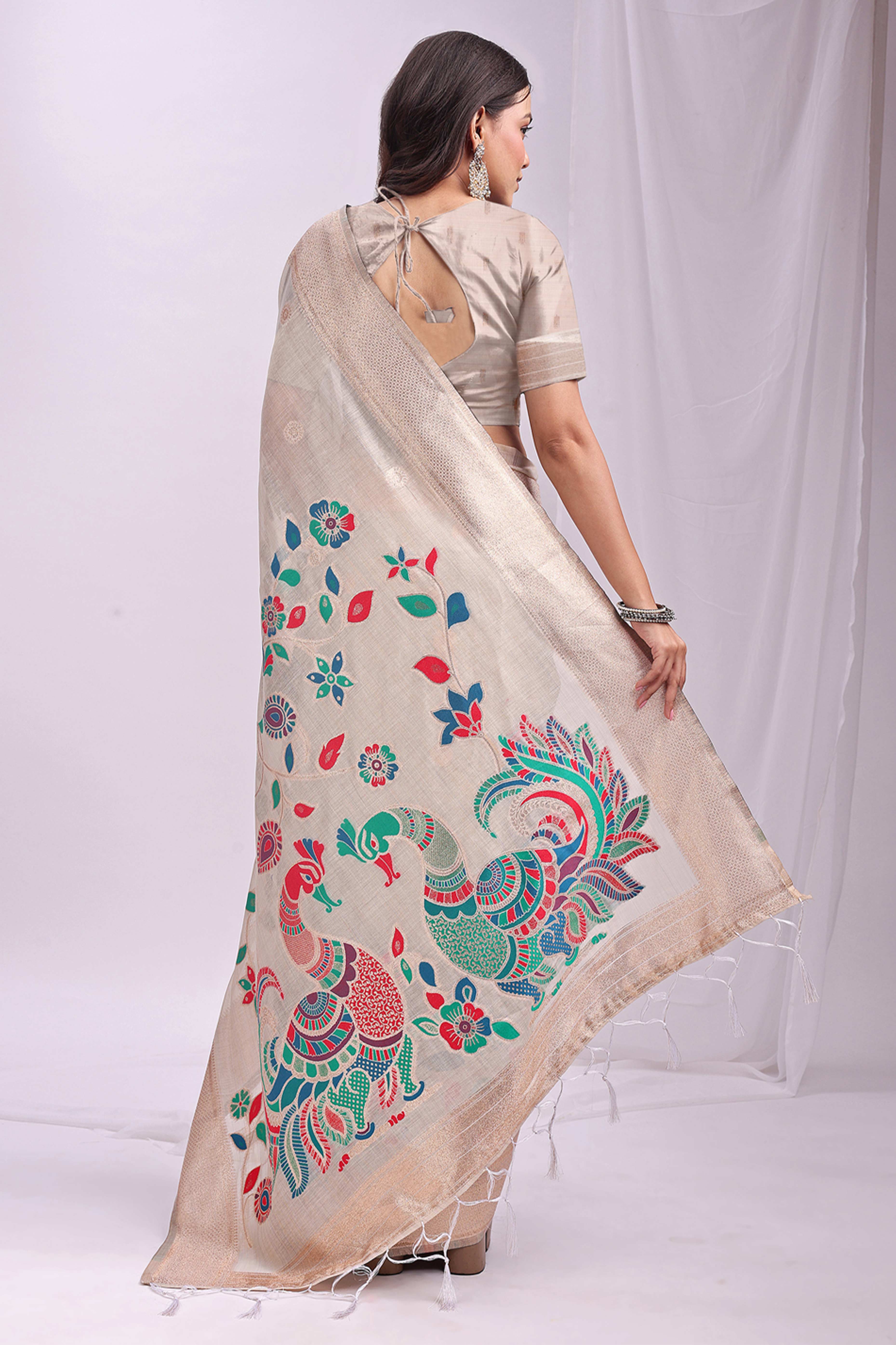 Cream Floral Woven Linen Cotton Saree Accented With Peacock Motif Pallu & Zari Border