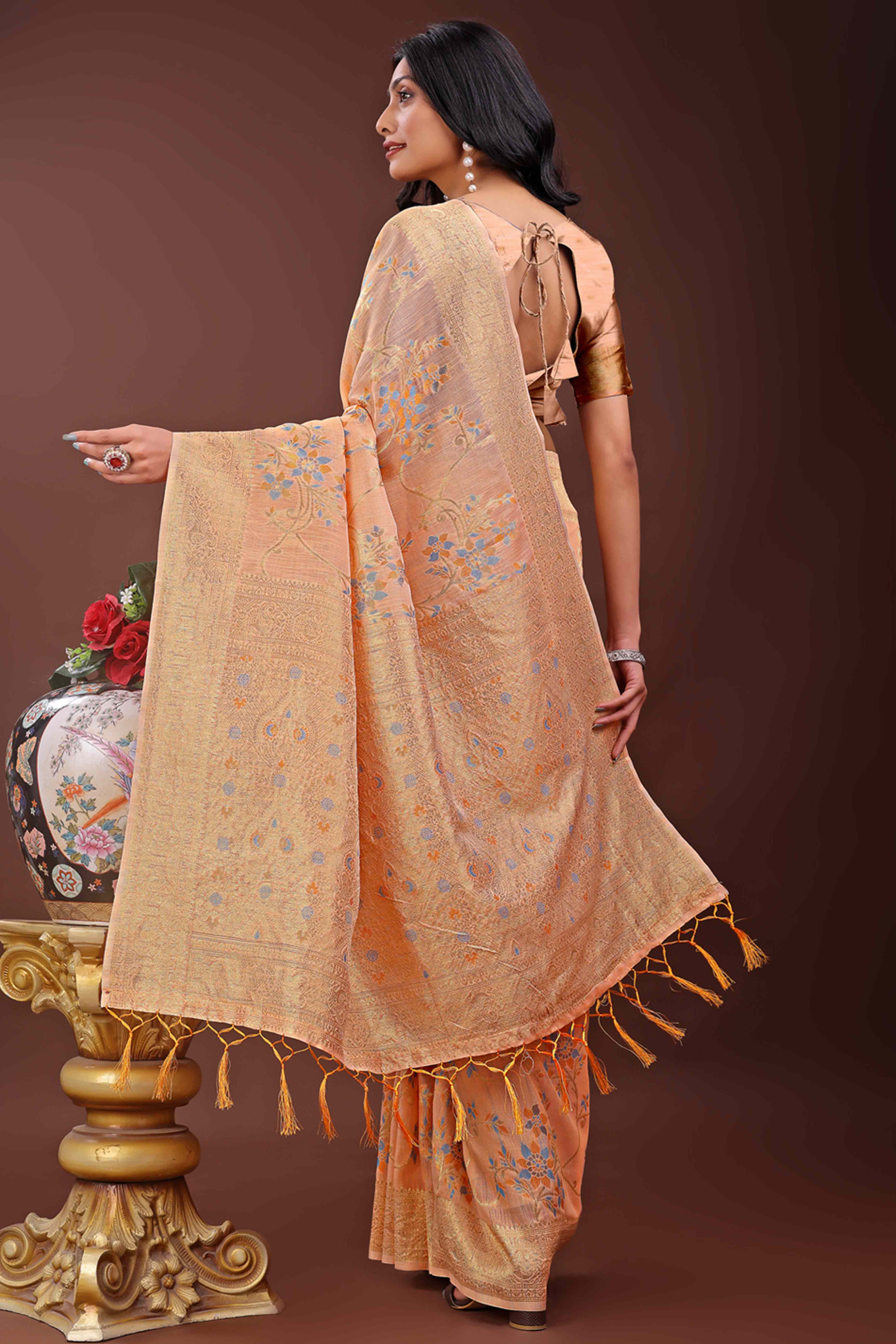 Orange Linen Cotton Saree With Intricate Floral Zari Weaving & Tassel Edge