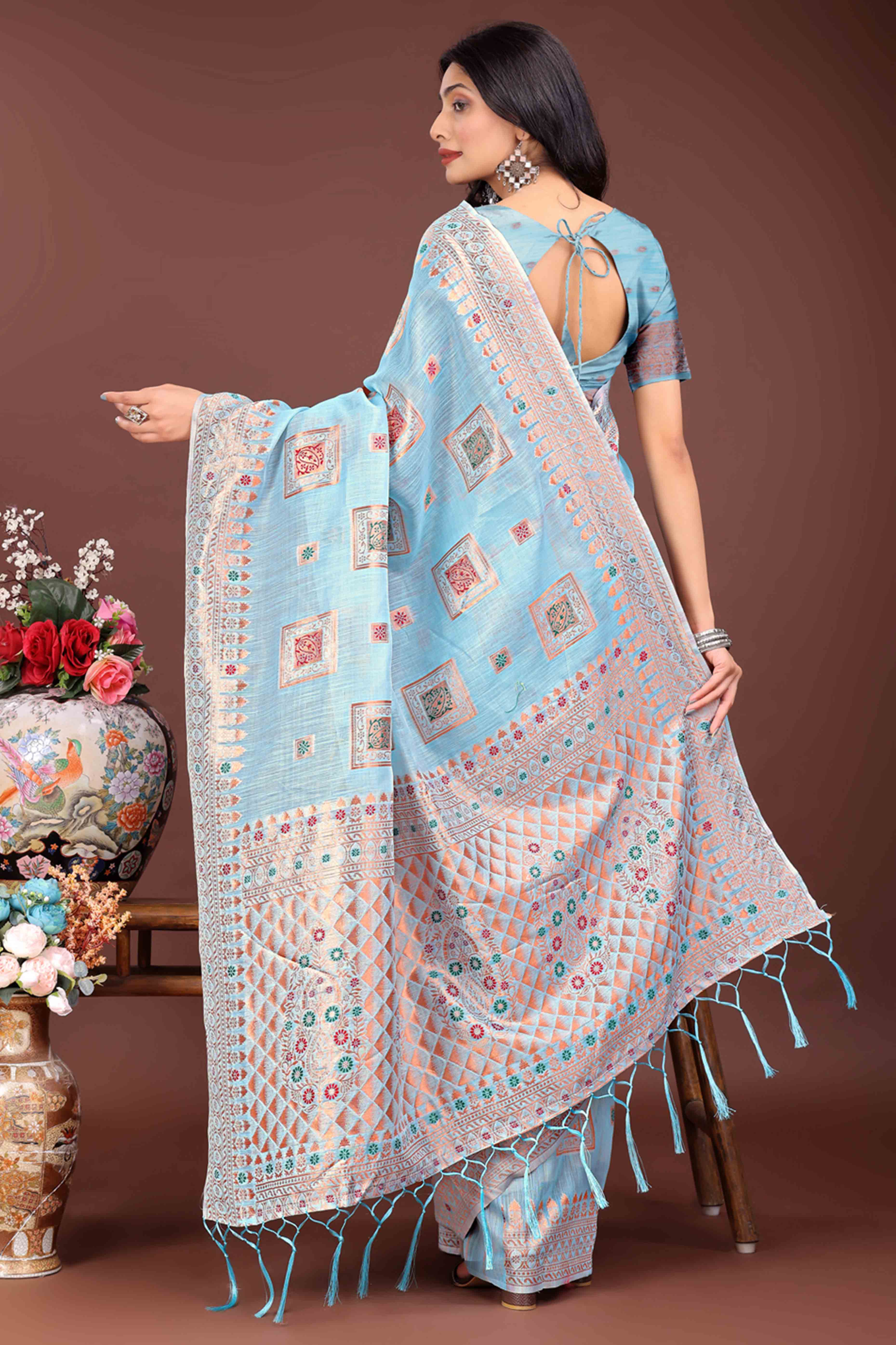 Elegant Floral Zari Weaving Embellished Sky Blue Saree In Linen Cotton with Tassel Accents