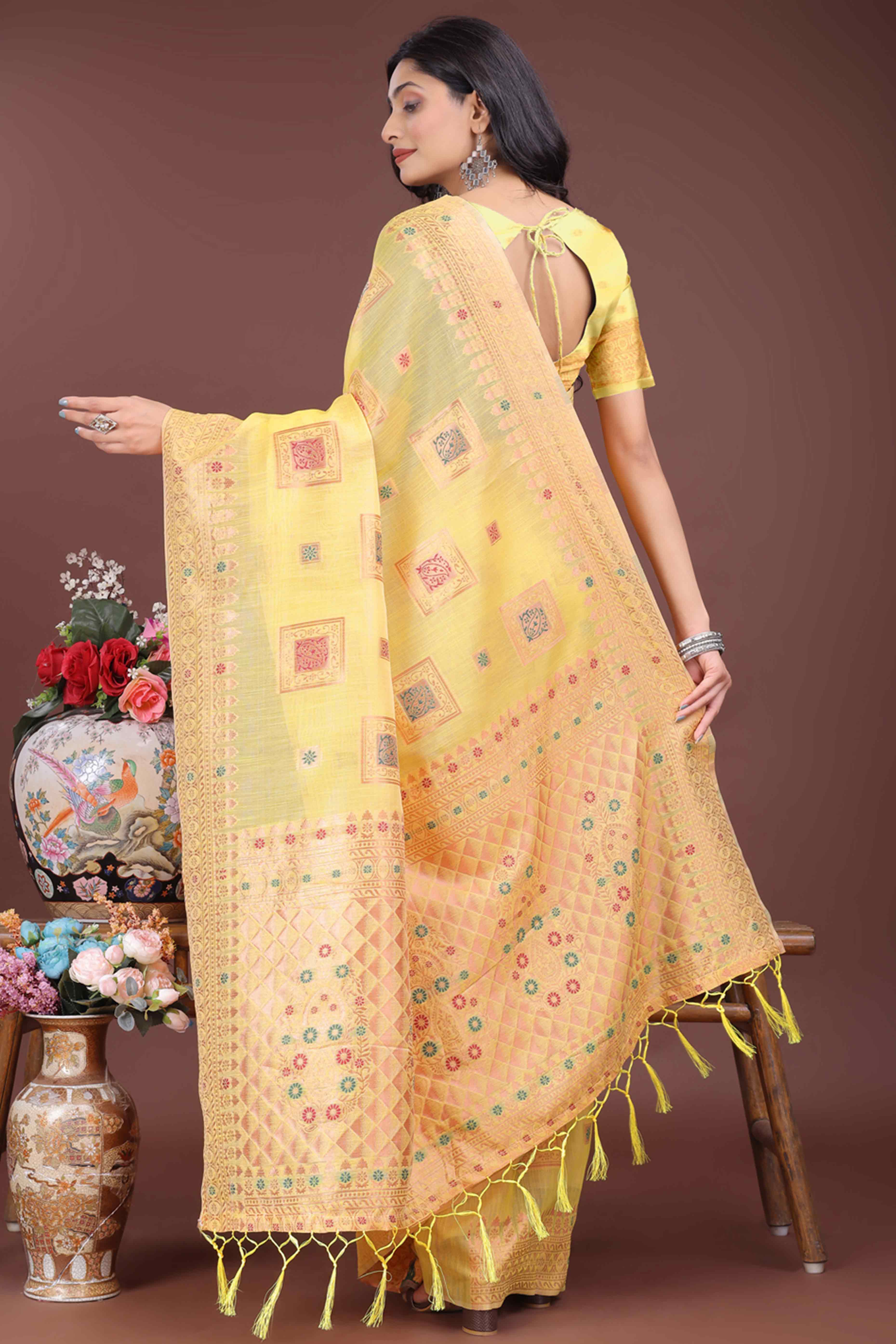 Dazzling Floral Zari Weaving Embellished Yellow Saree In Linen Cotton with Tassel Accents