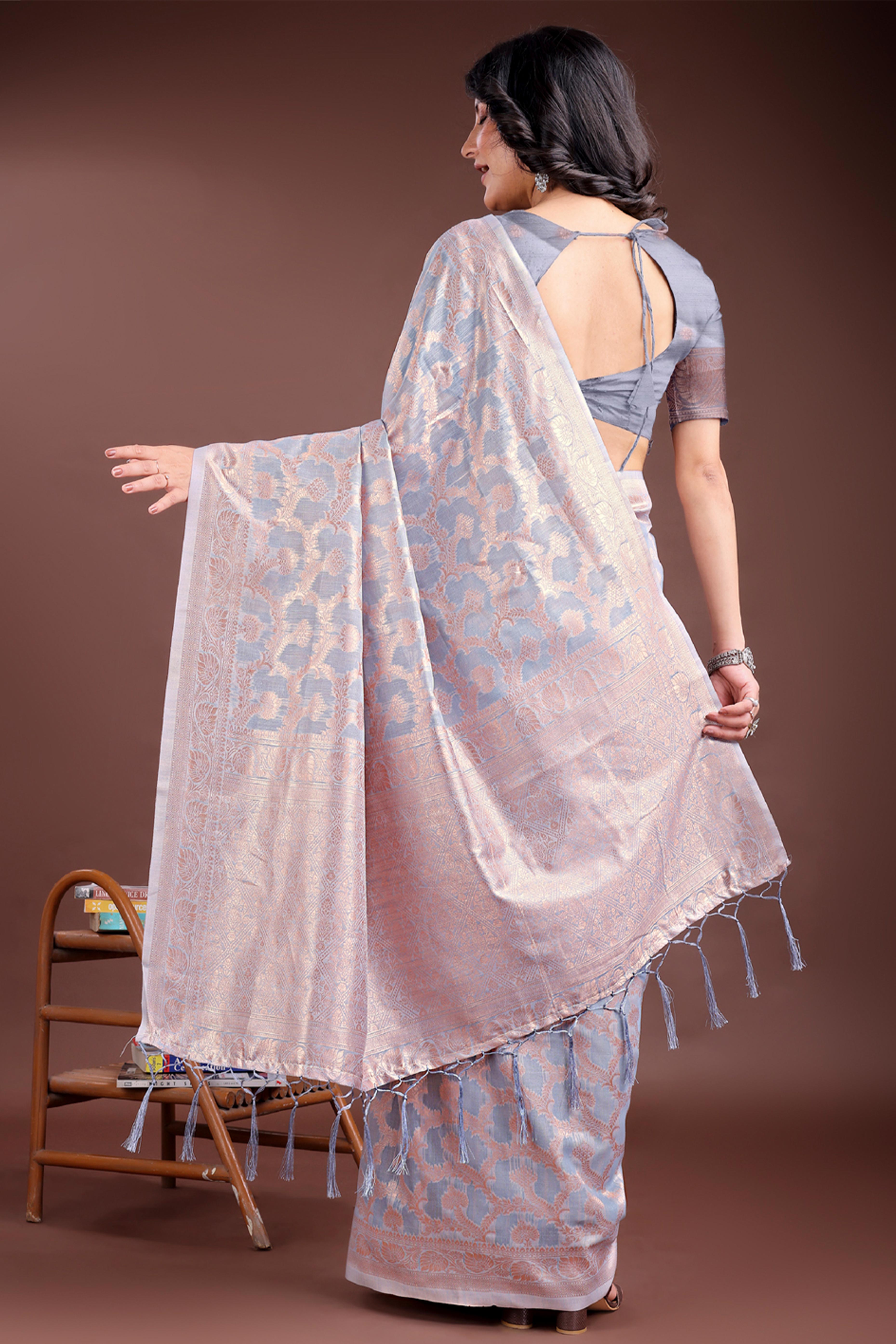 Grey Linen Cotton Saree with Lustrous Zari Borders and Elegant Tassel Accents