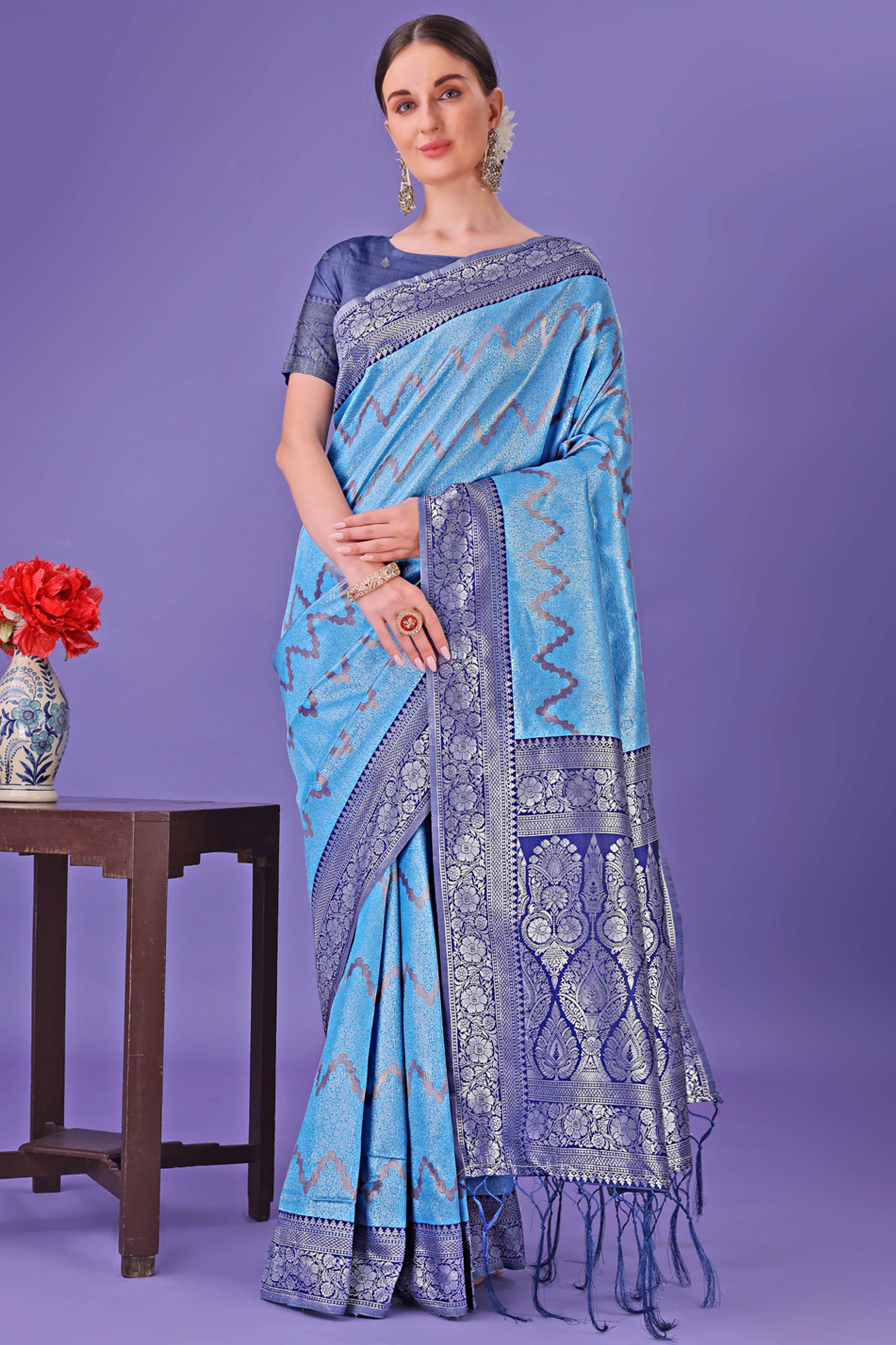 Blue Lichi Cotton Silk Saree Adorned With Floral Zari Weave & Tassels