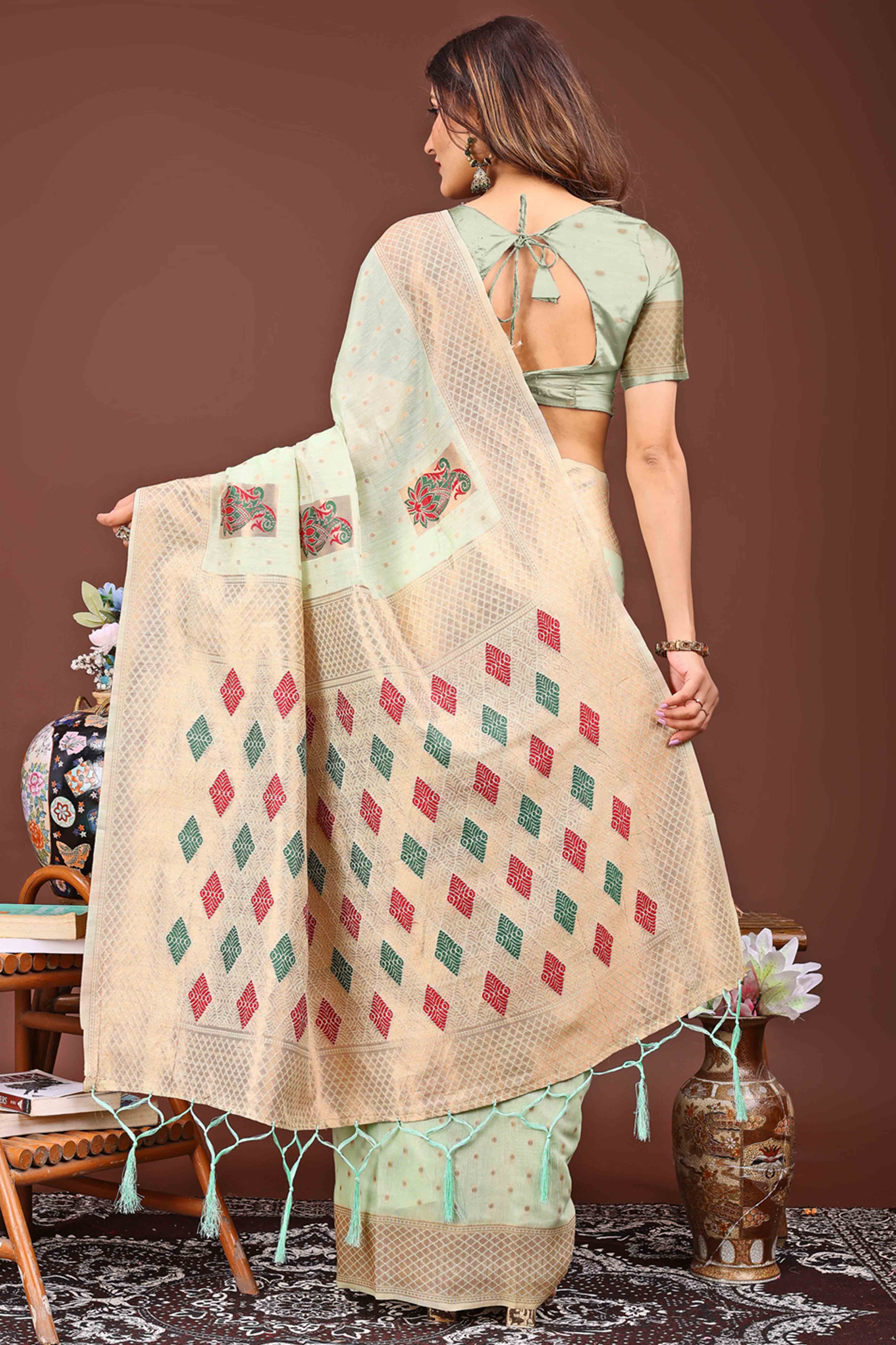 Light Green Floral Zari Weaving Linen Cotton Saree With Tassel Pallu Accent