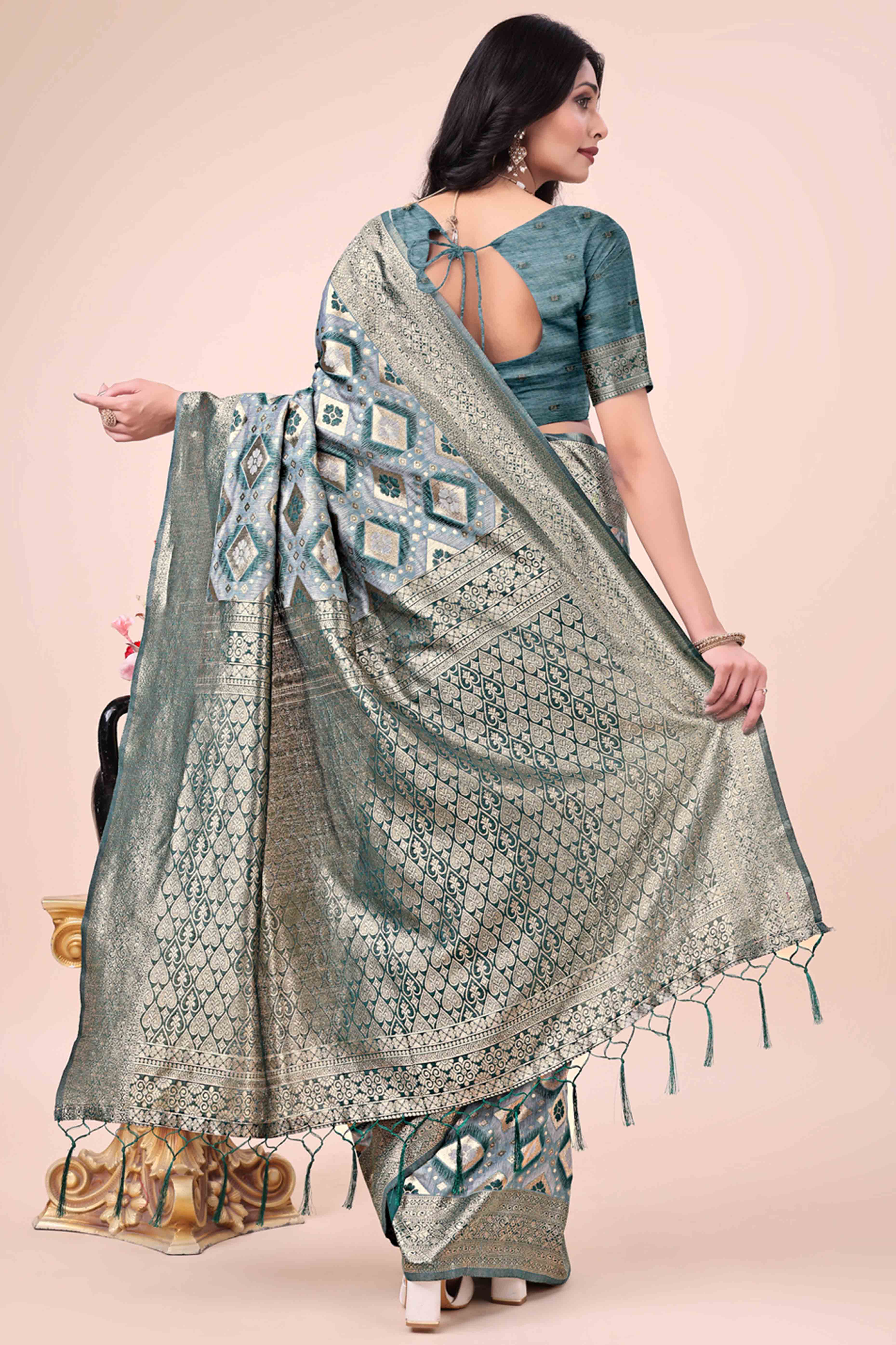 Floral Weaving On Green Cotton Blend Saree With Tassels