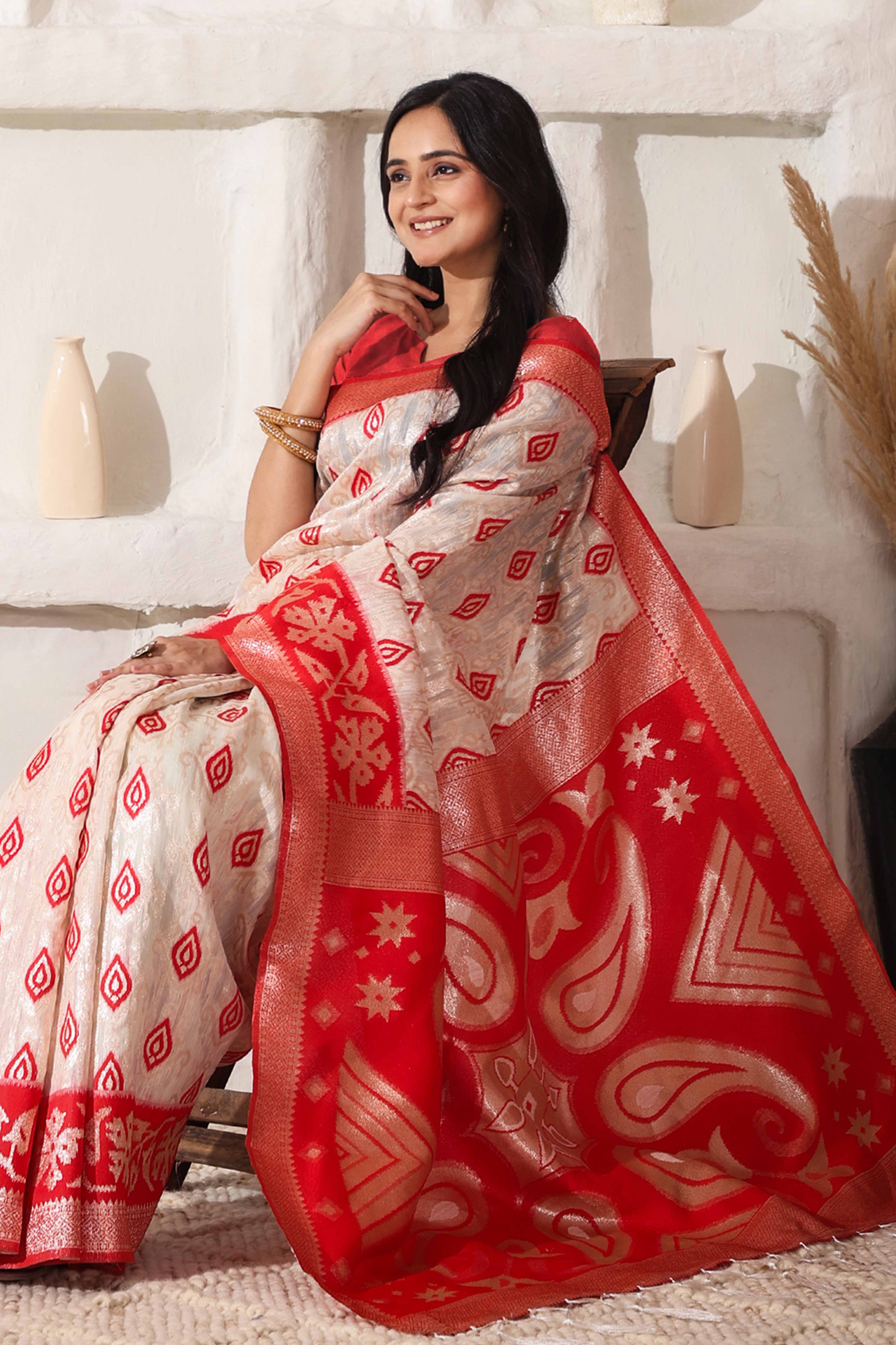 Classic White & Red Saree In Linen Cotton With Rich Zari Weaving And Tassel Accents