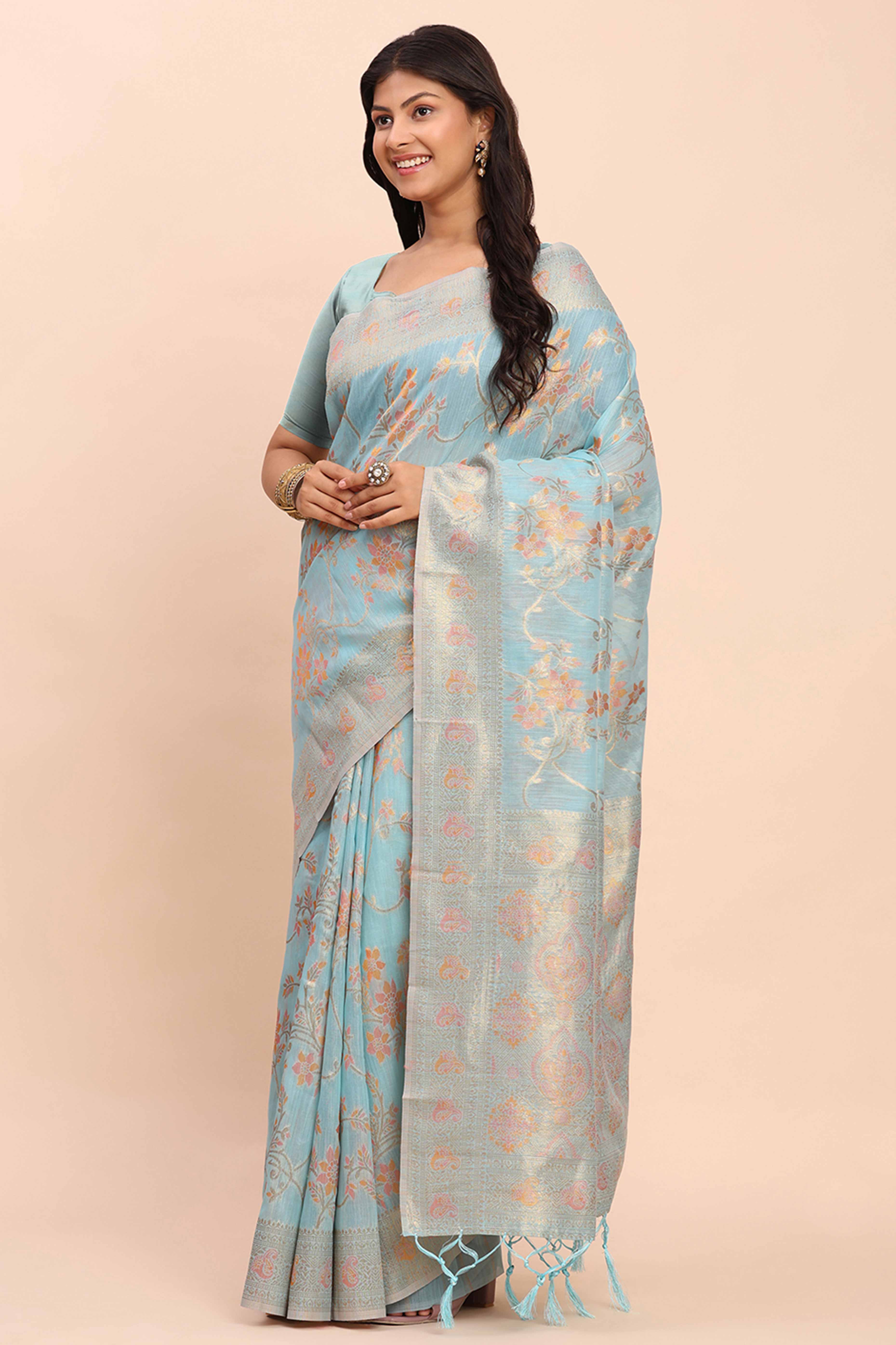 Sky Blue Linen Cotton Saree Showcasing Floral Zari Weaves & A Tasselled Finish Pallu