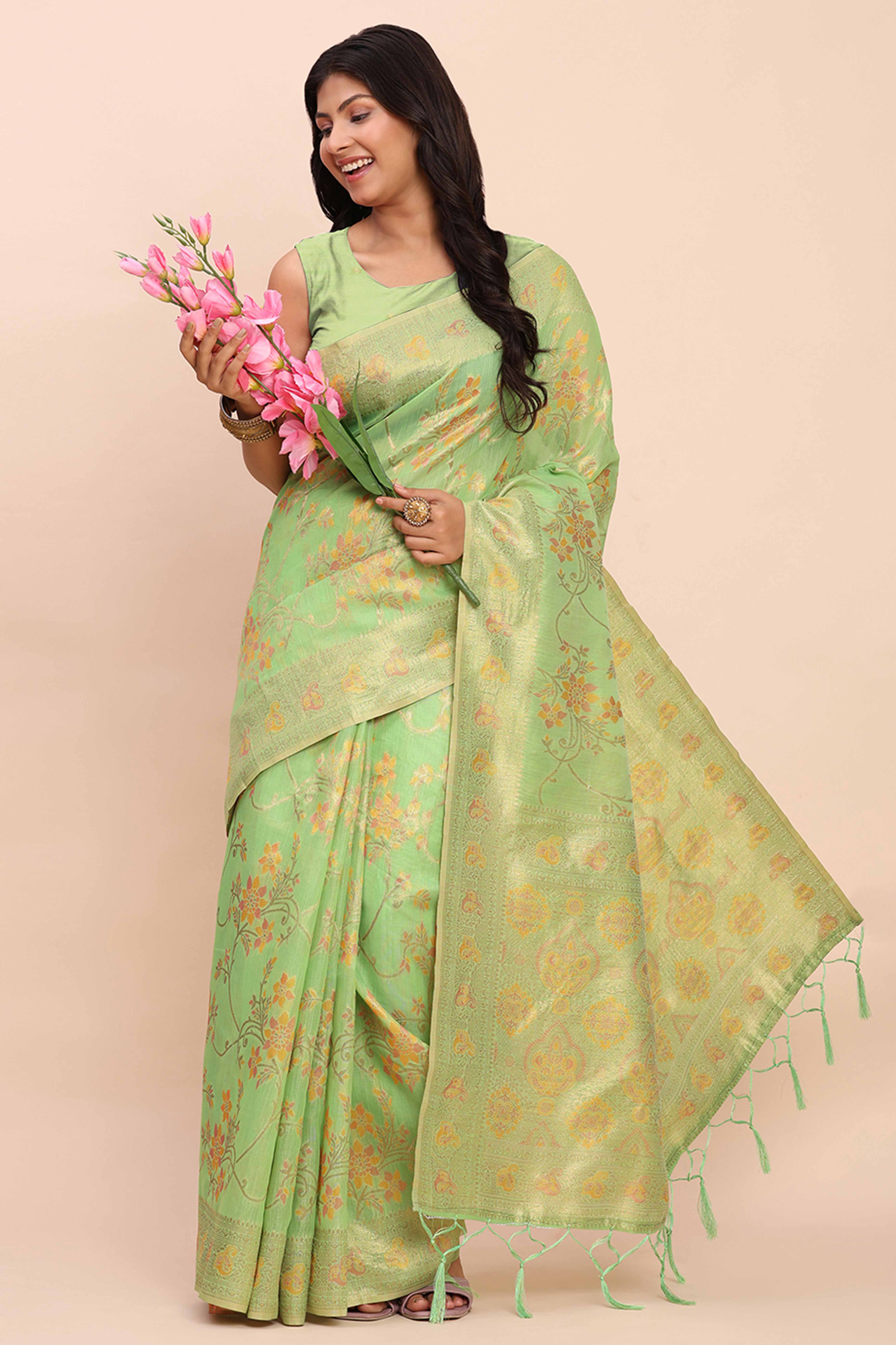 Green Linen Cotton Saree Showcasing Floral Zari Weaves & A Tasselled Finish Pallu