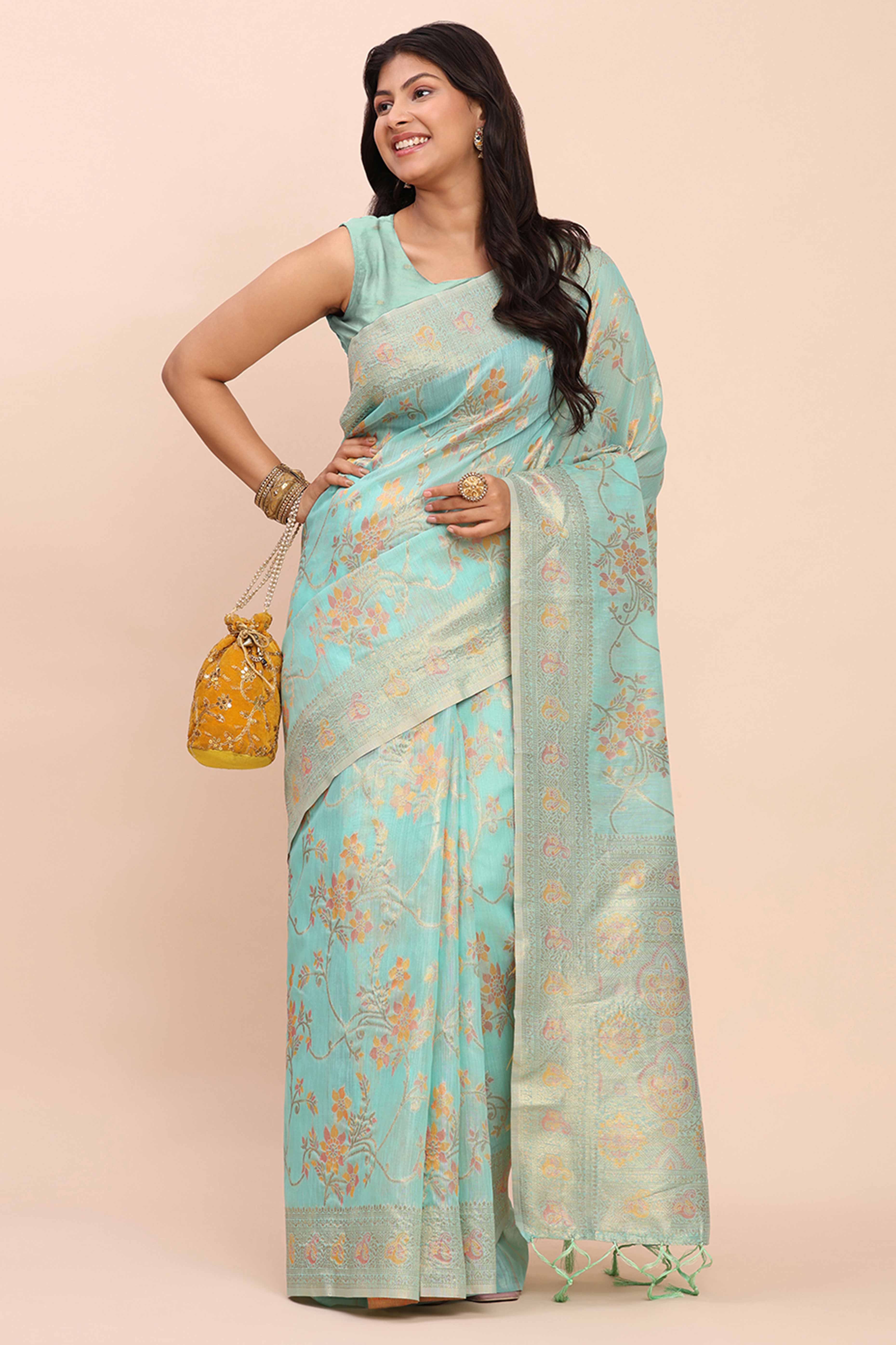 Turquoise Linen Cotton Saree Showcasing Floral Zari Weaves & A Tasselled Finish Pallu