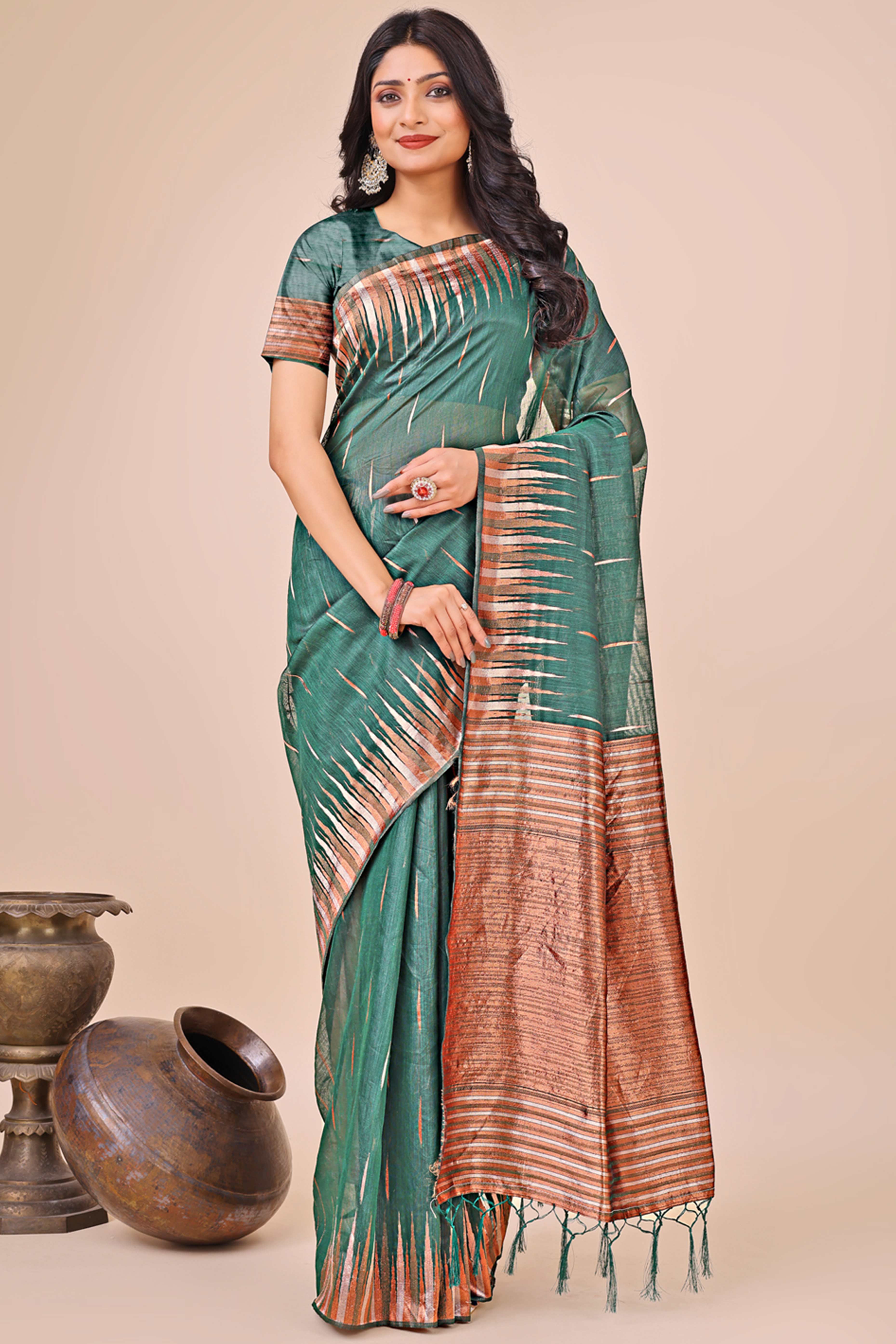 Green Saree In Linen Cotton With Exquisite Zari Weaving & Subtle Tassel Border