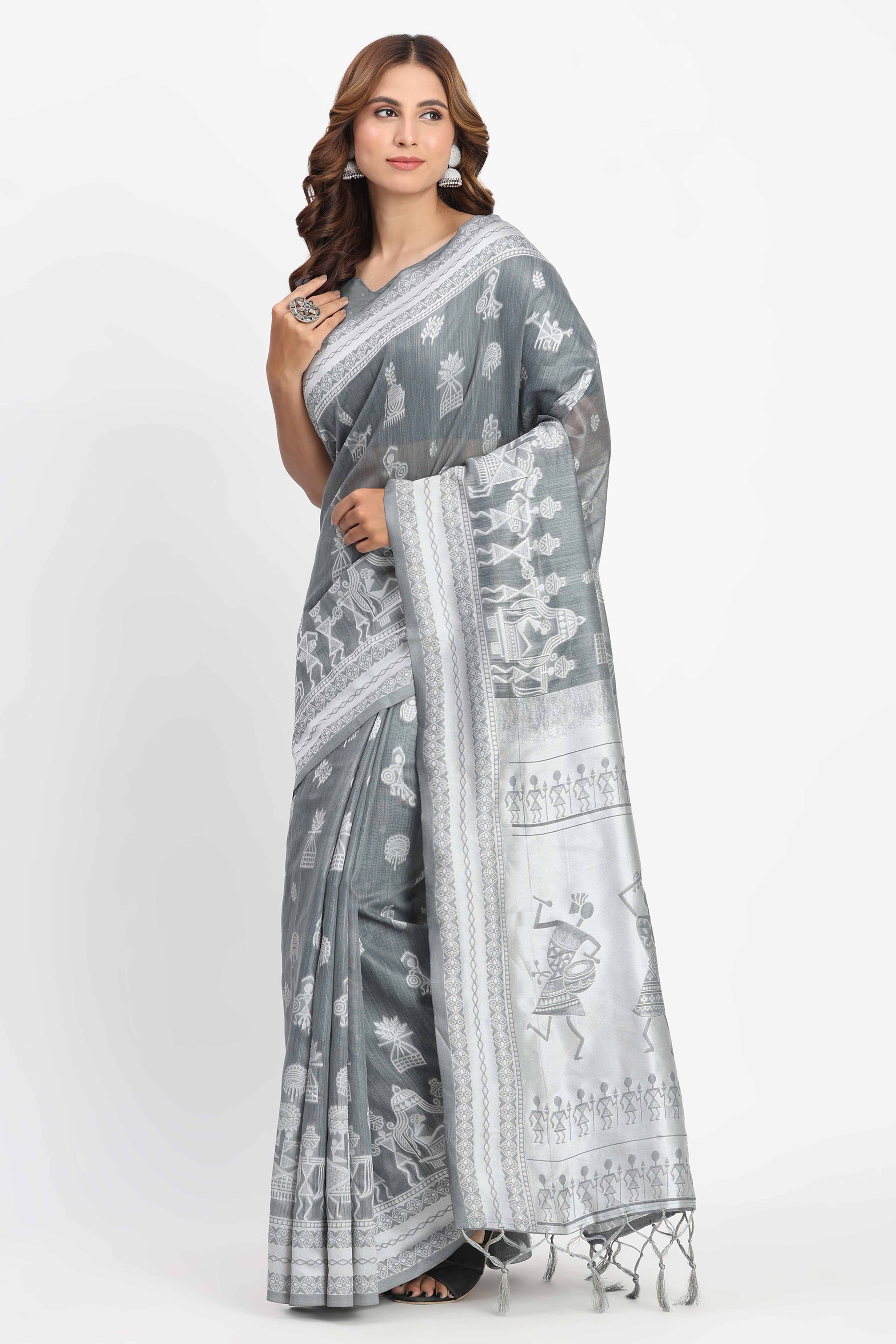 Grey Linen Cotton Saree Showcasing Traditional Warli Motifs In Zari Weaving With Tassel Pallu