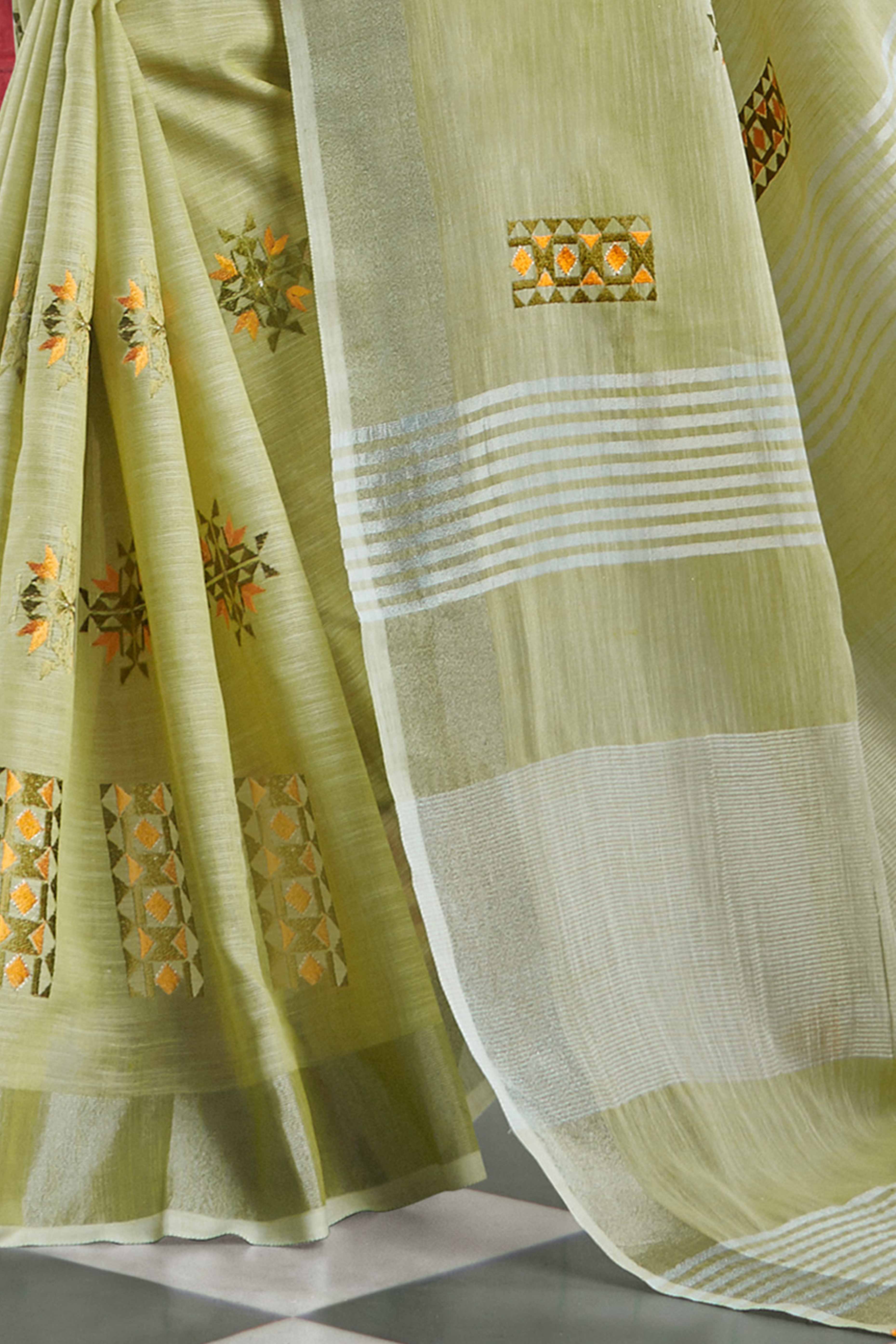 Pista Green Linen Saree with Intricate Floral Embroidery and Classic Weaving