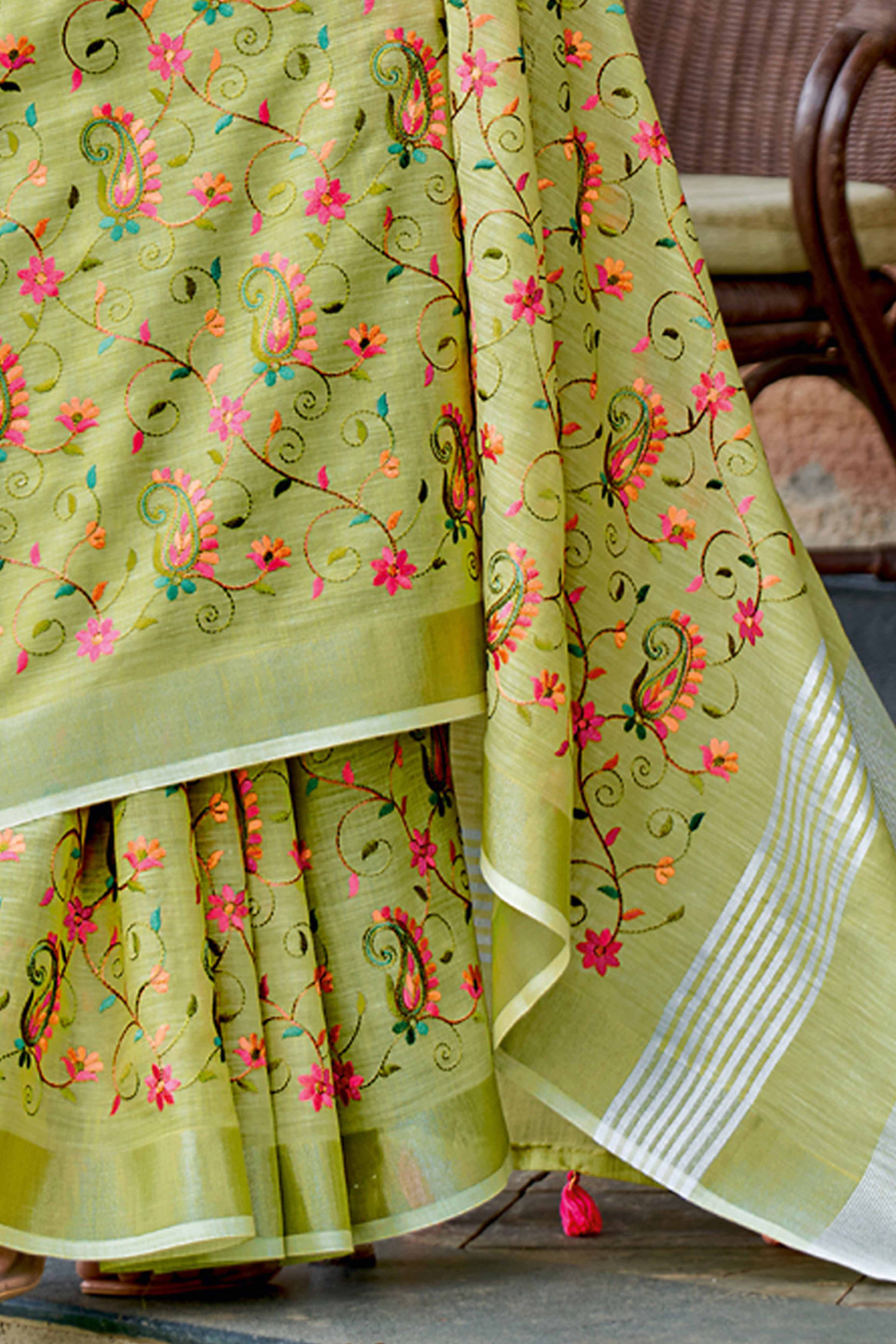 Handwoven Green Linen Saree with Floral Embroidered Patterns
