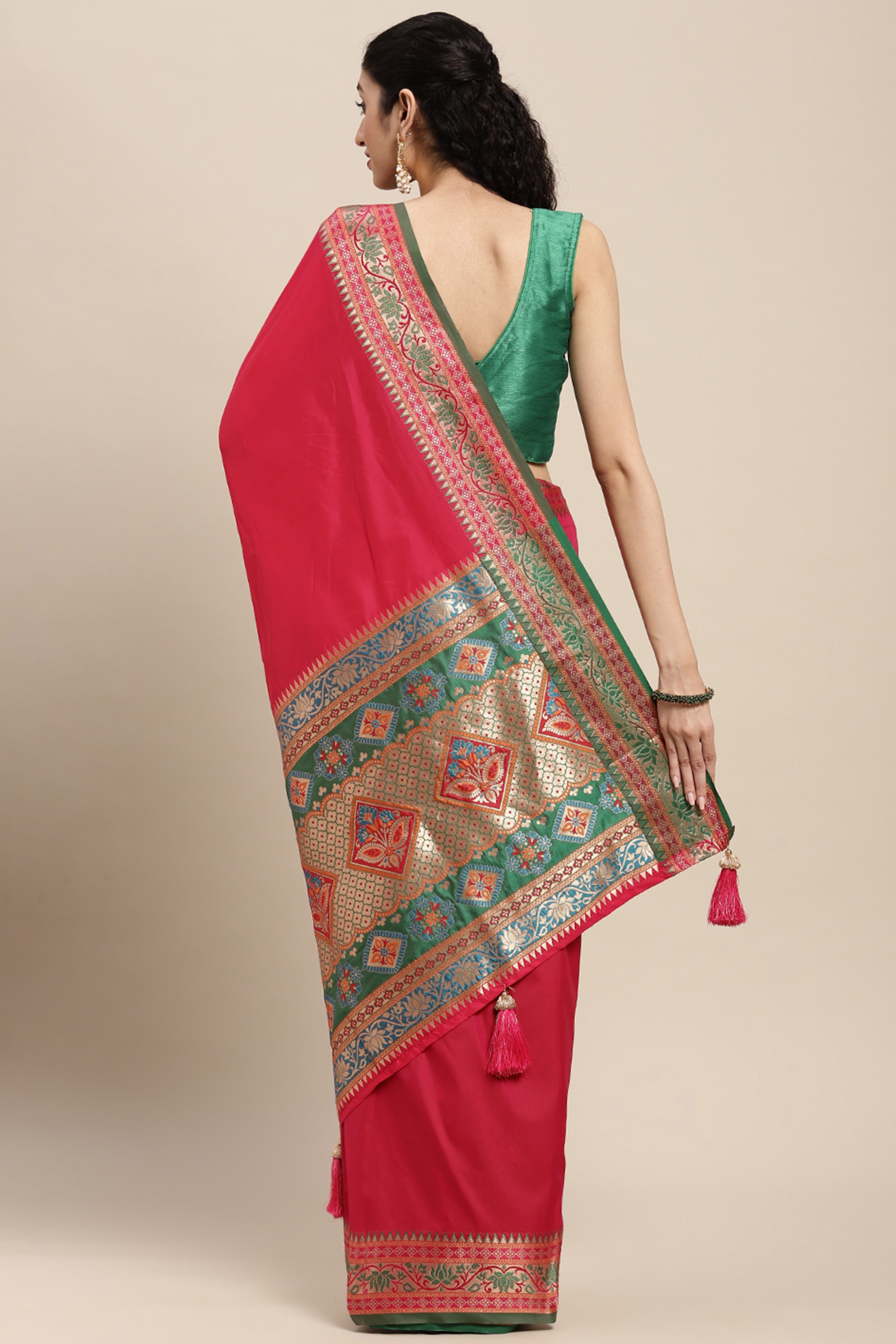 Graceful Pink Solid Saree Highlighted With Floral Zari Weaving On Silk Blend & Tassel Pallu