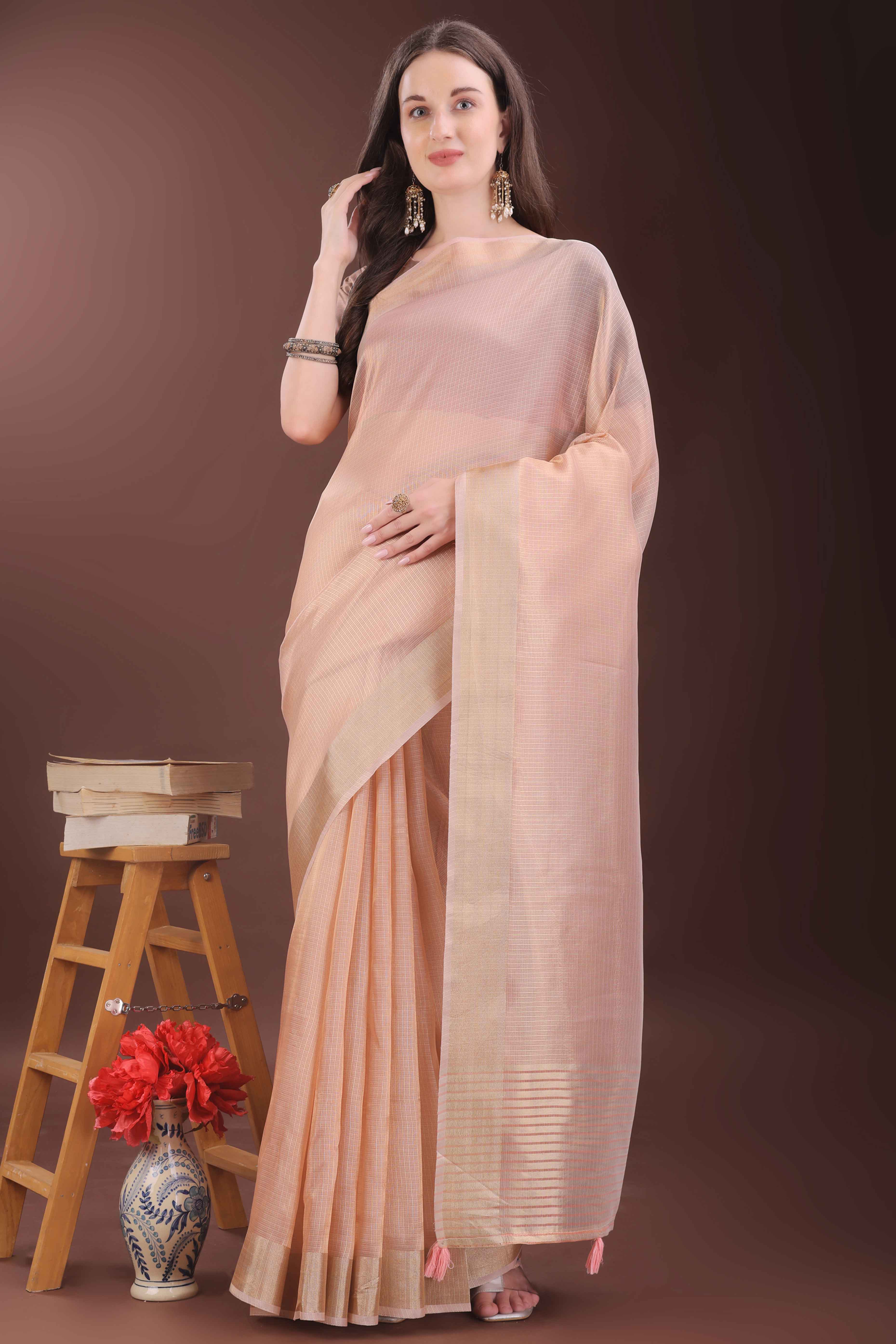 Peach Zari Woven Organza Saree With Graceful Tassel Border
