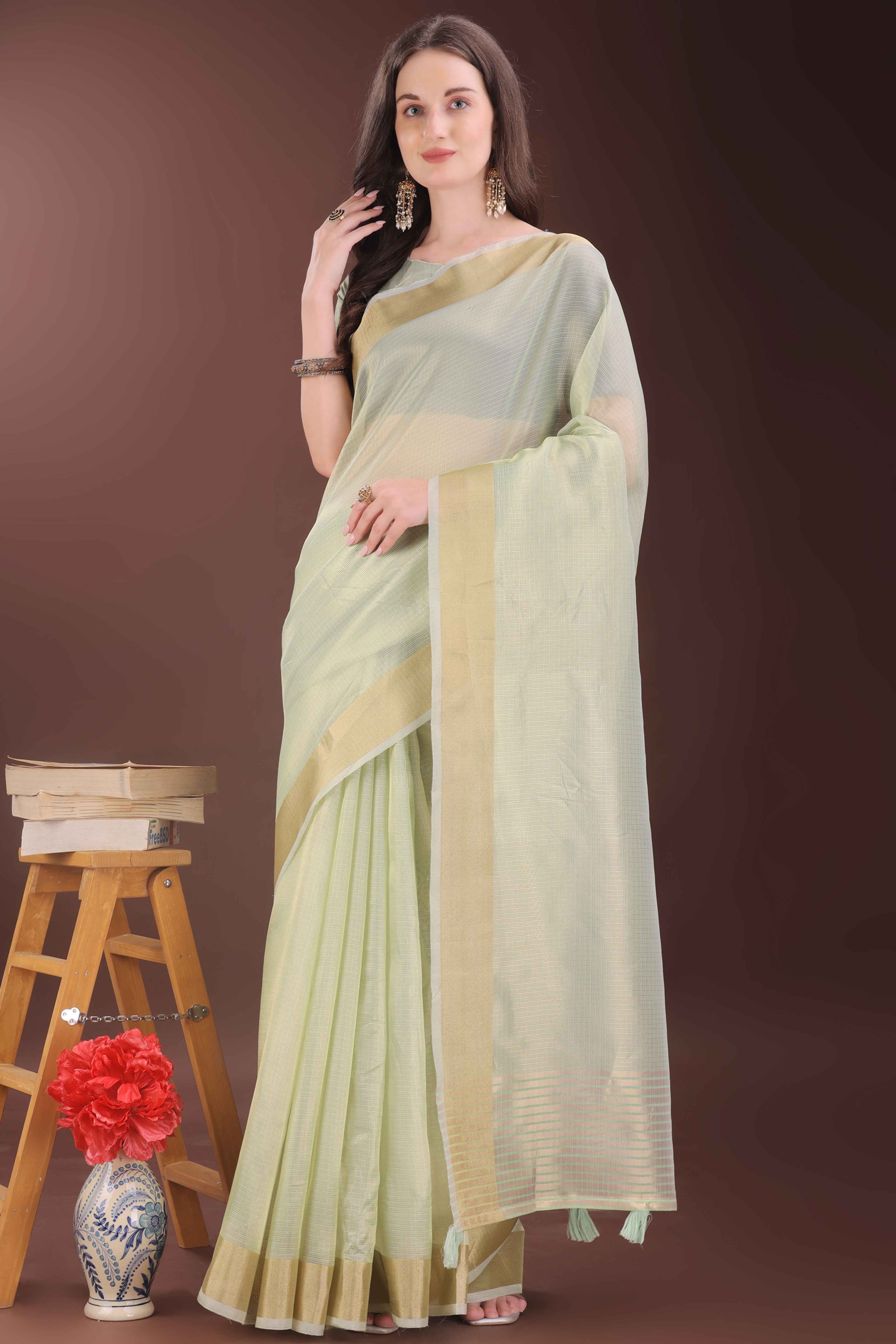Light Green Zari Woven Organza Saree With Graceful Tassel Border