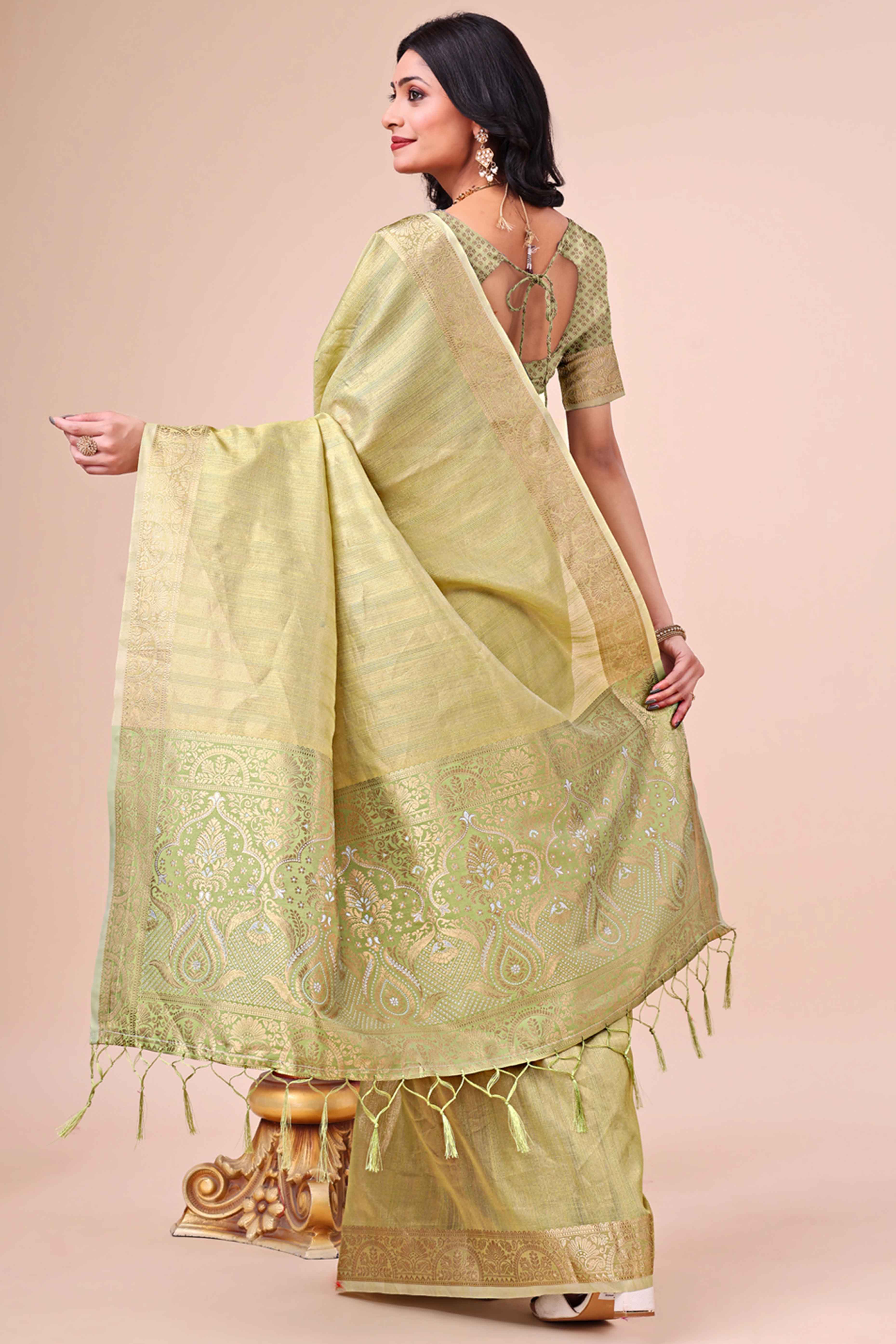 Green Organza Saree With Floral Zari Weave & Tassel Accents