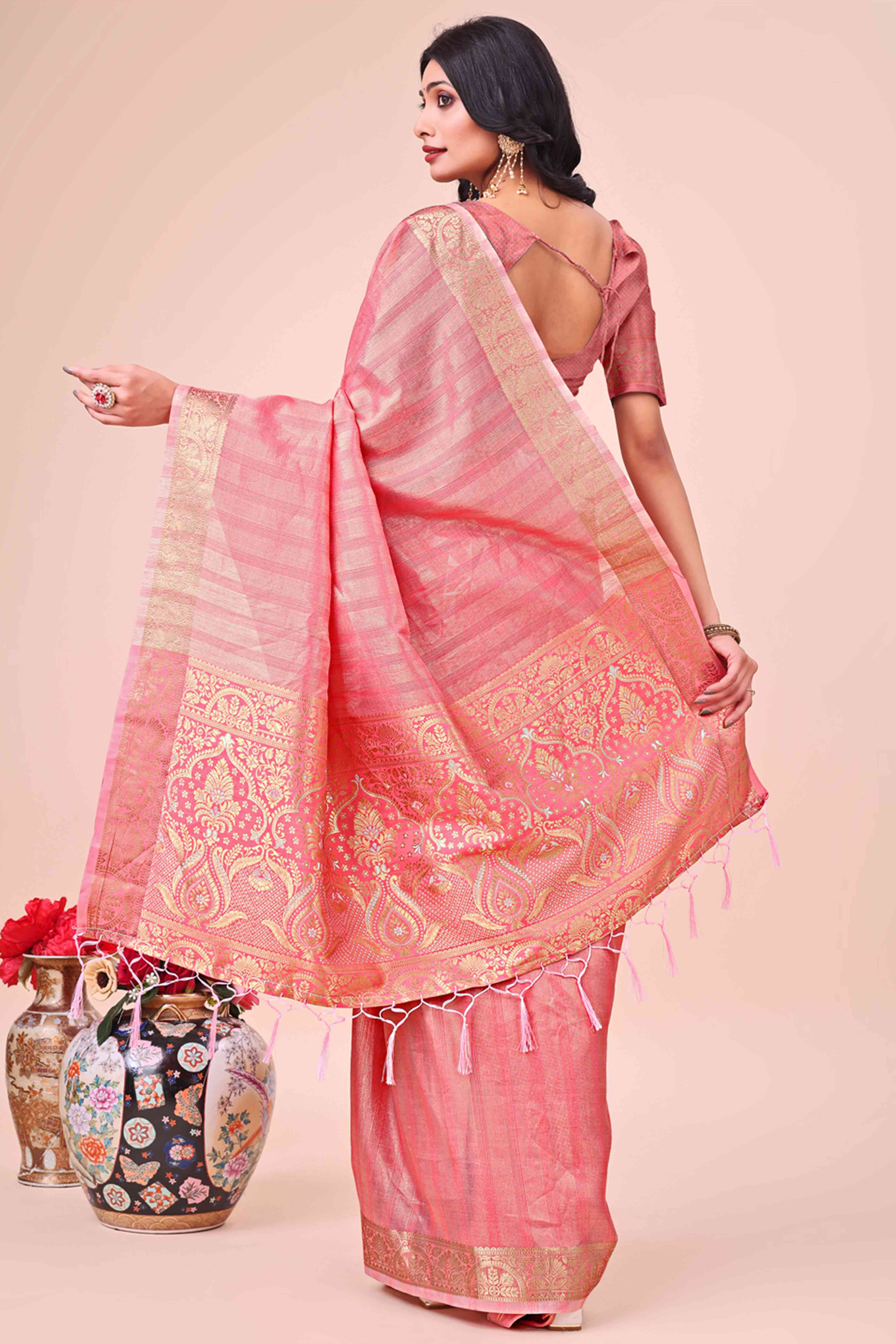 Peach Organza Saree With Floral Zari Weave & Tassel Accents