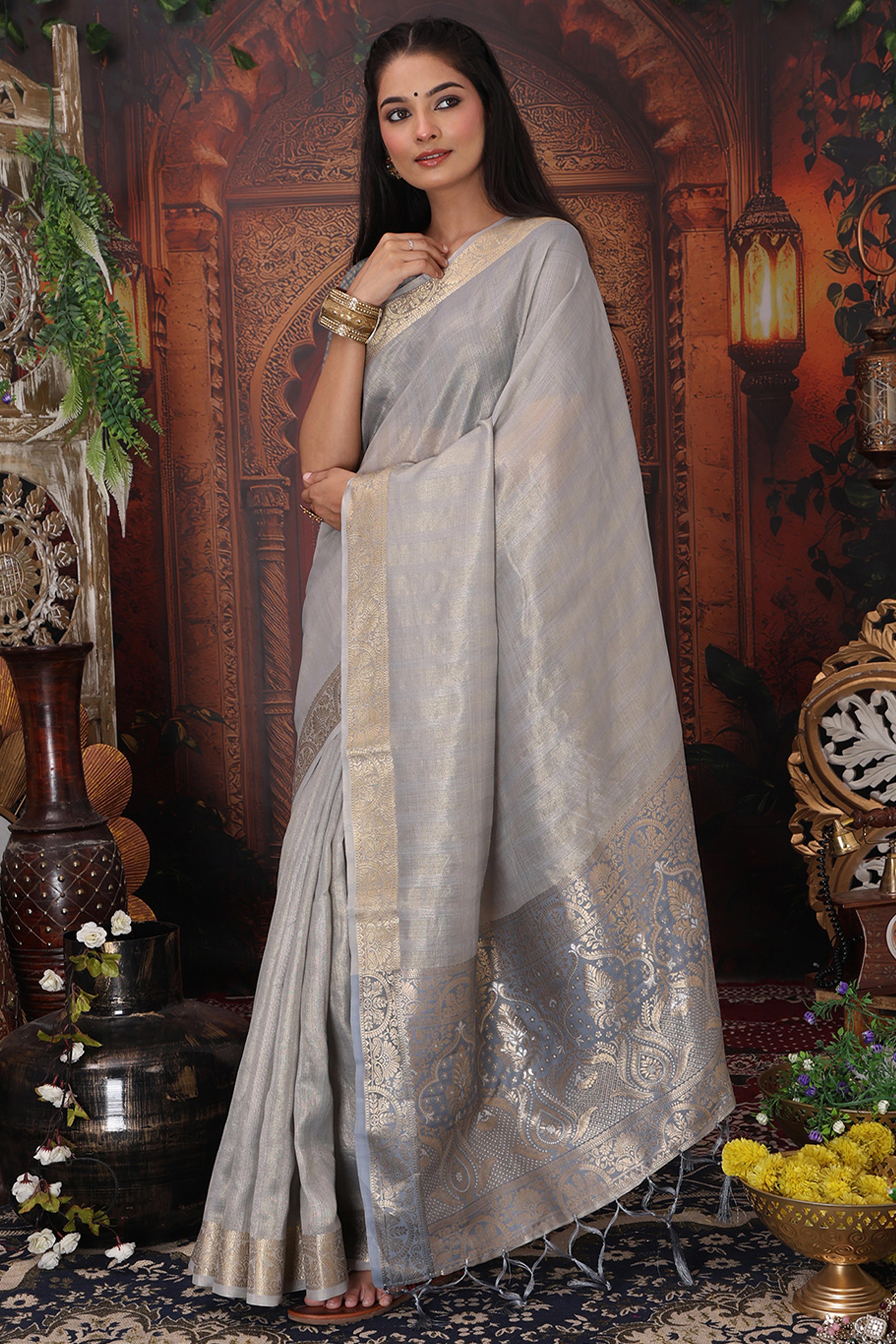 Grey Organza Saree Adorned With Floral Zari Weaving & Graceful Tassel Pallu