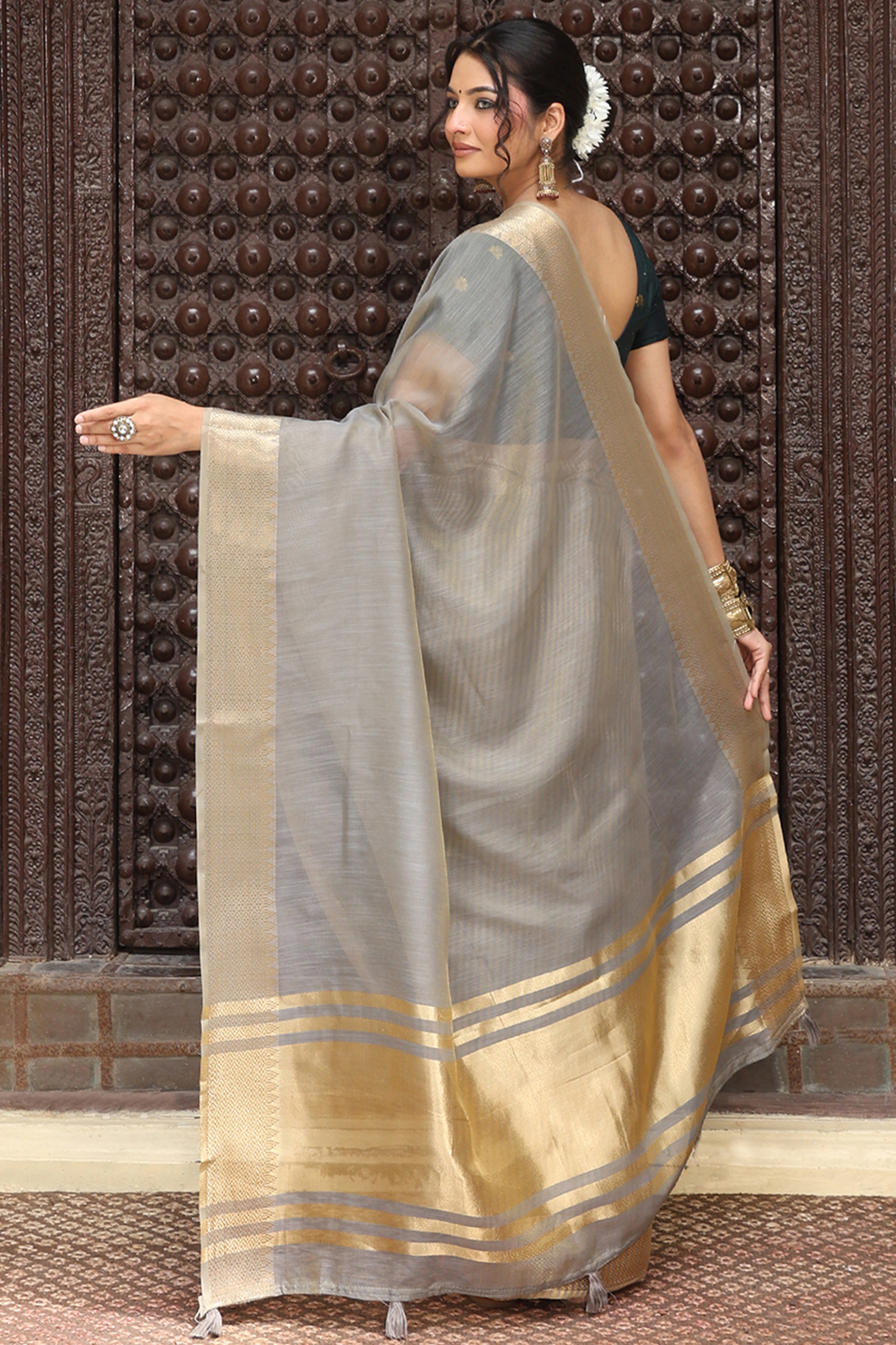 Trendy Grey Cotton Blend Saree Showcasing Elegant Zari Weaving & Tassel Border Pallu