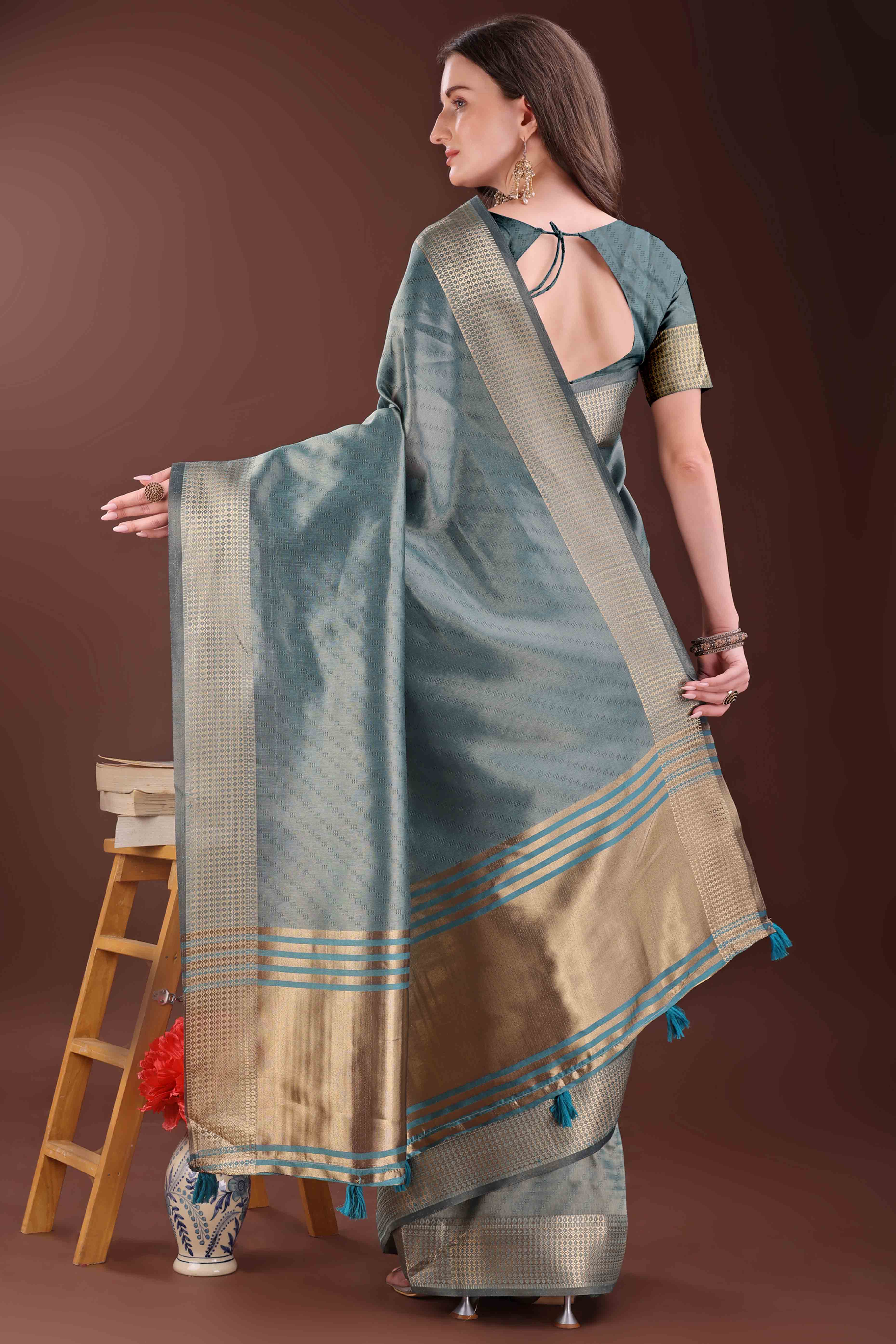 Peacock Blue Zari Weaving Organza Saree With Tassel Border