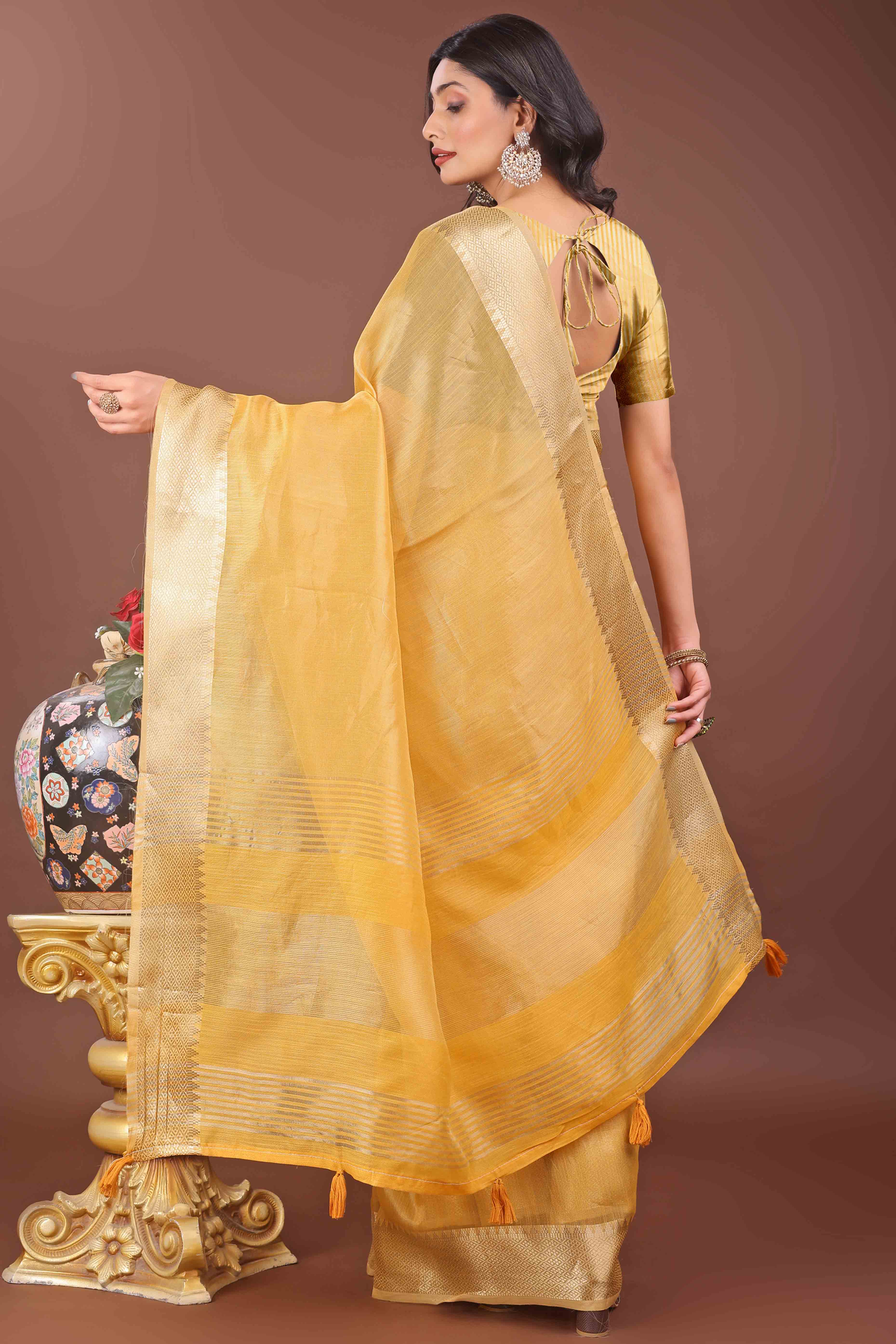 Yellow Solid With Zari Woven Organza Saree With Tassel Border