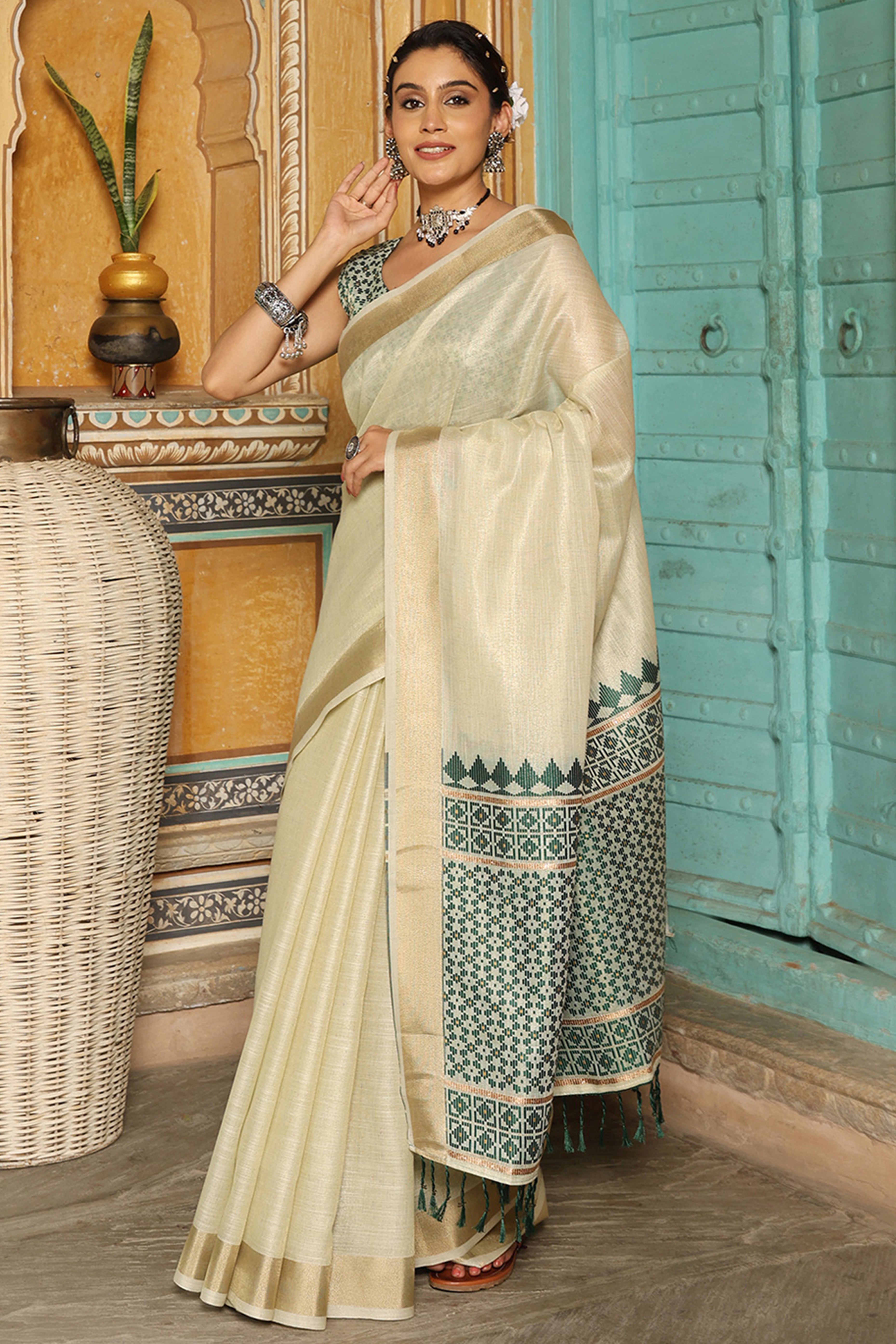 Minimalist Cream Linen Saree with Elegant Green Pallu in Handloom Weave Look