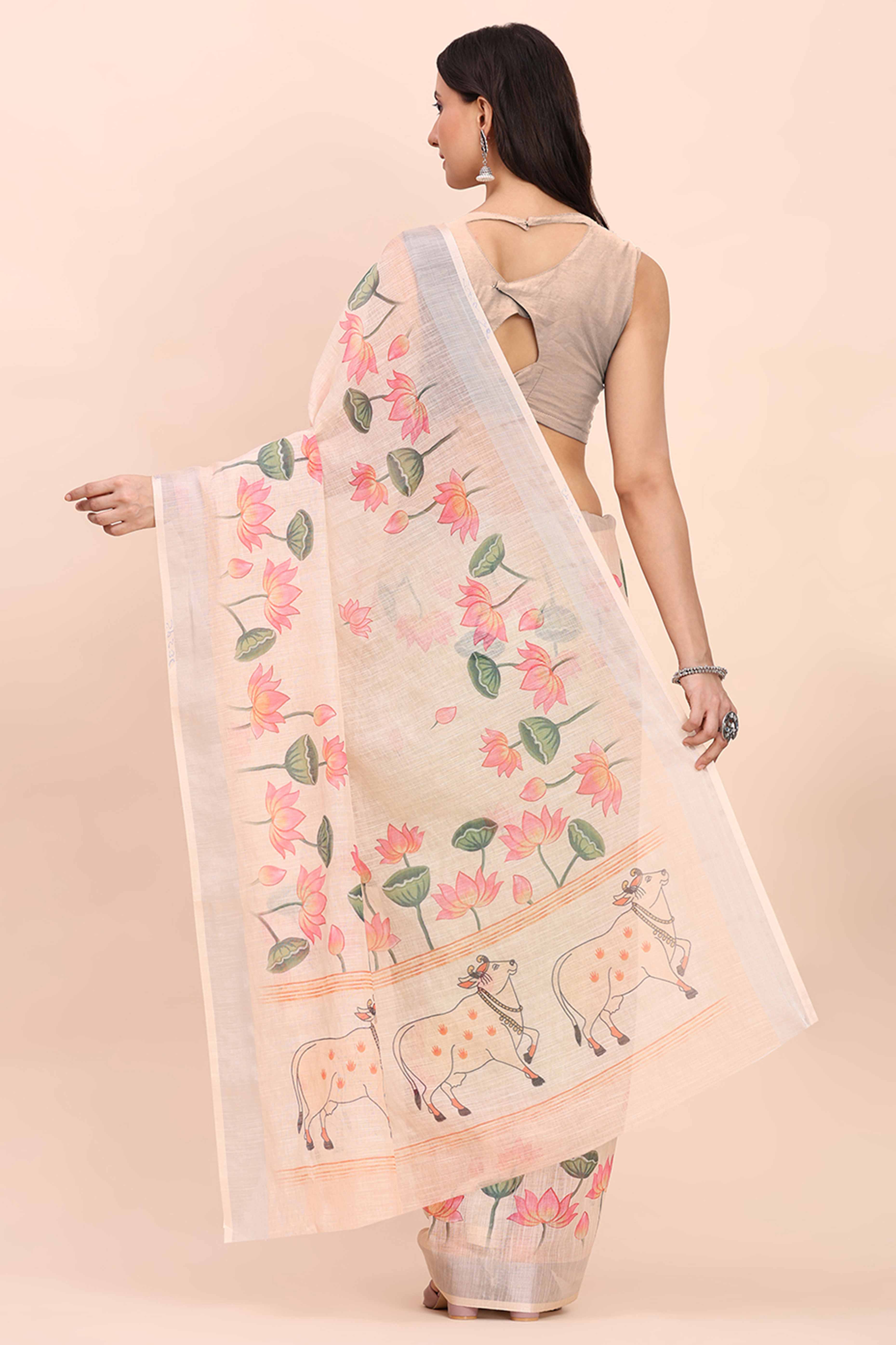 Beige Linen Cotton Saree Featuring Floral Prints & Woven Border